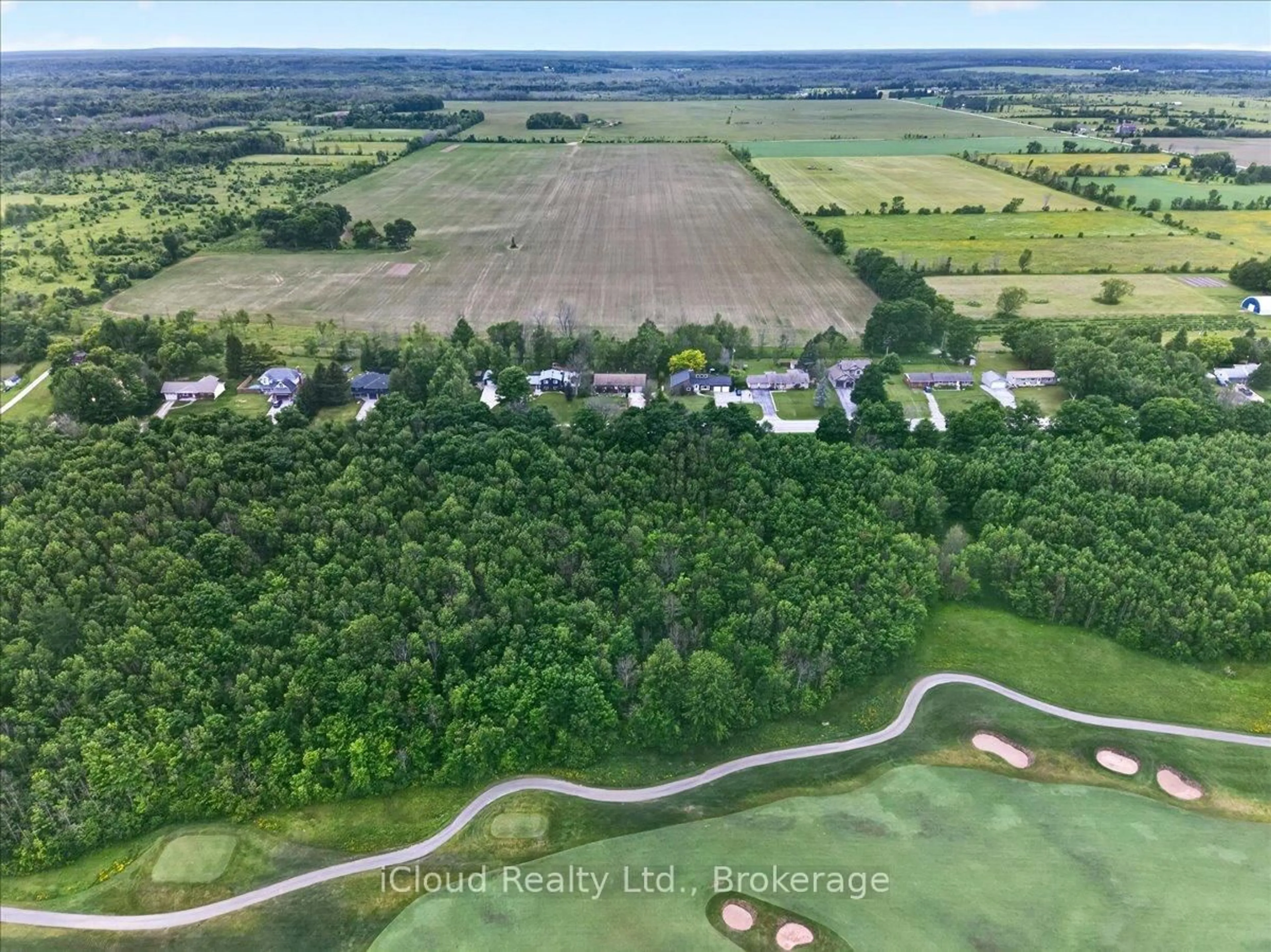 A pic from outside/outdoor area/front of a property/back of a property/a pic from drone, unknown for 319378 Grey Road 1, Georgian Bluffs Ontario N0H 1S0