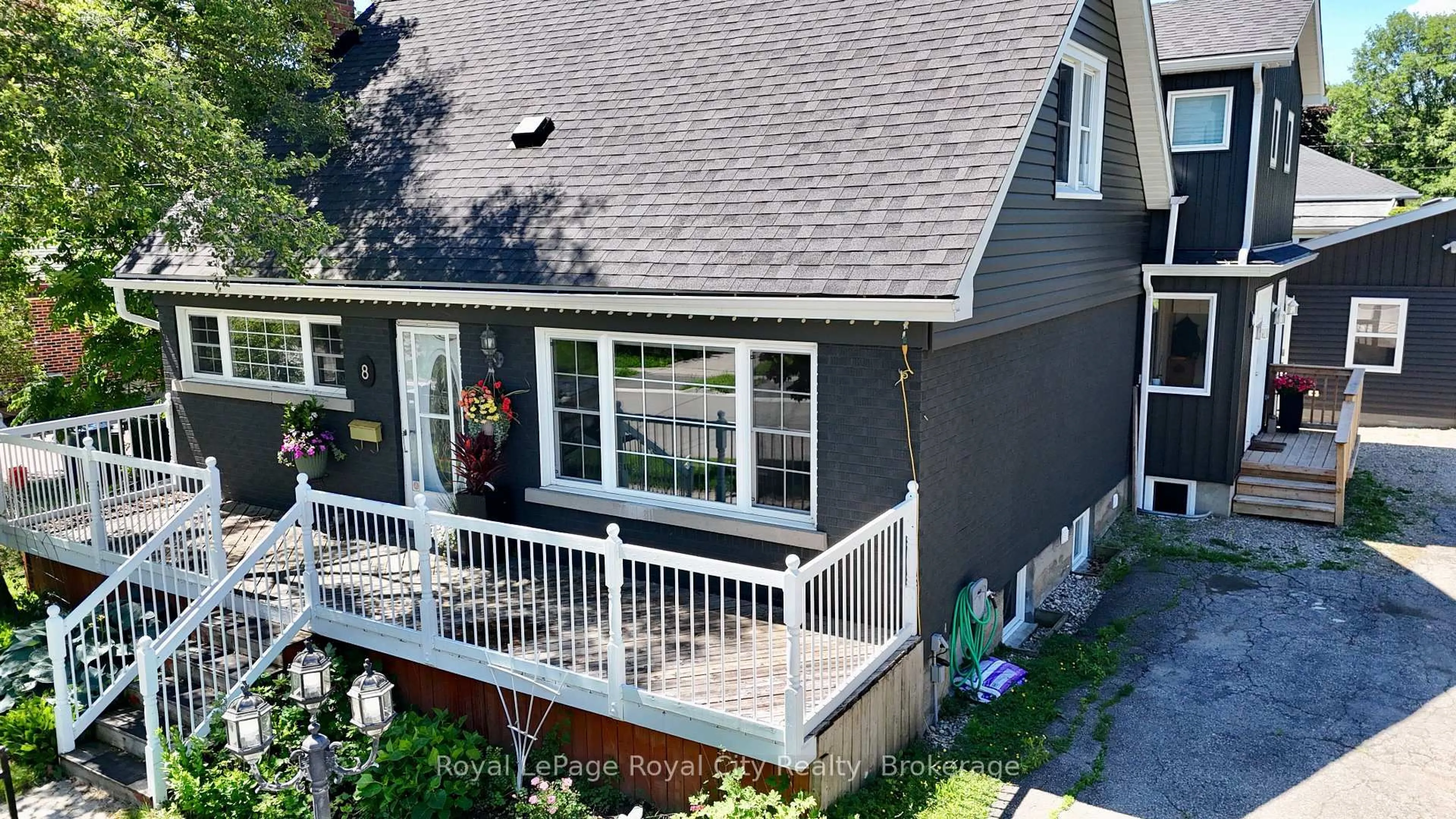 Home with vinyl exterior material, street for 8 Rosewood Ave, Guelph Ontario N1H 5Z9