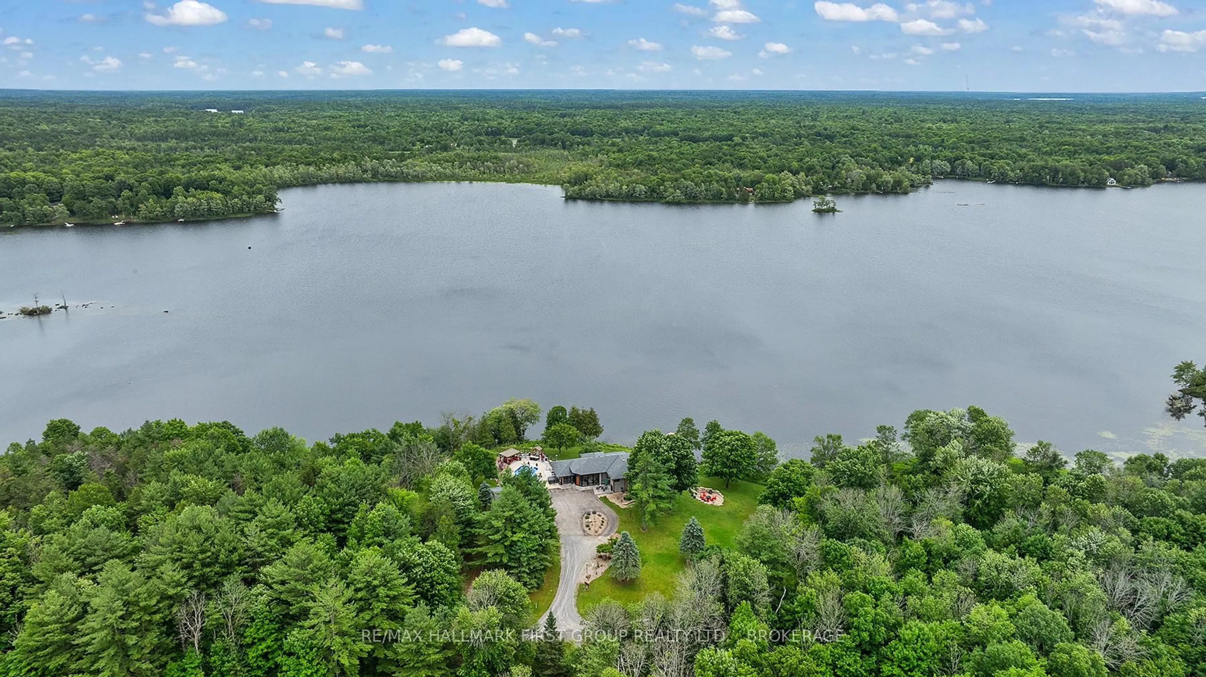 A pic from outside/outdoor area/front of a property/back of a property/a pic from drone, water/lake/river/ocean view for 120 Black Lake Route 1, Perth Ontario K7H 3C5