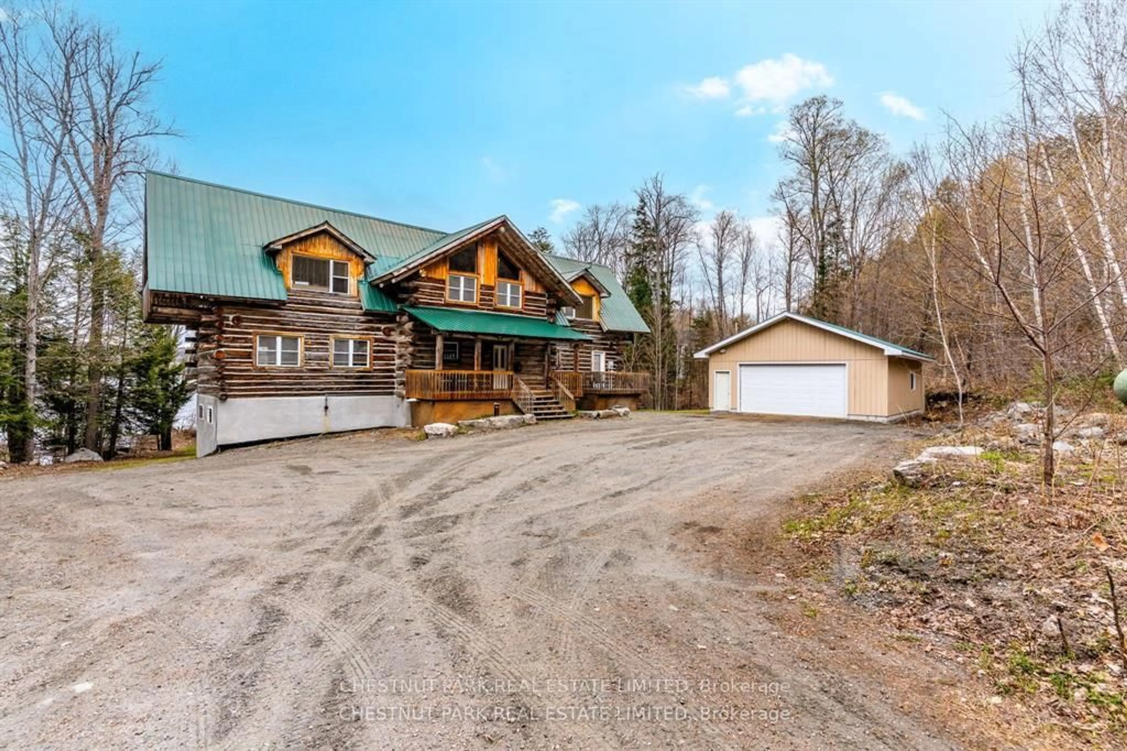 A pic from outside/outdoor area/front of a property/back of a property/a pic from drone, unknown for 1068 Rattlesnake Rd, Dysart et al Ontario K0M 1S0