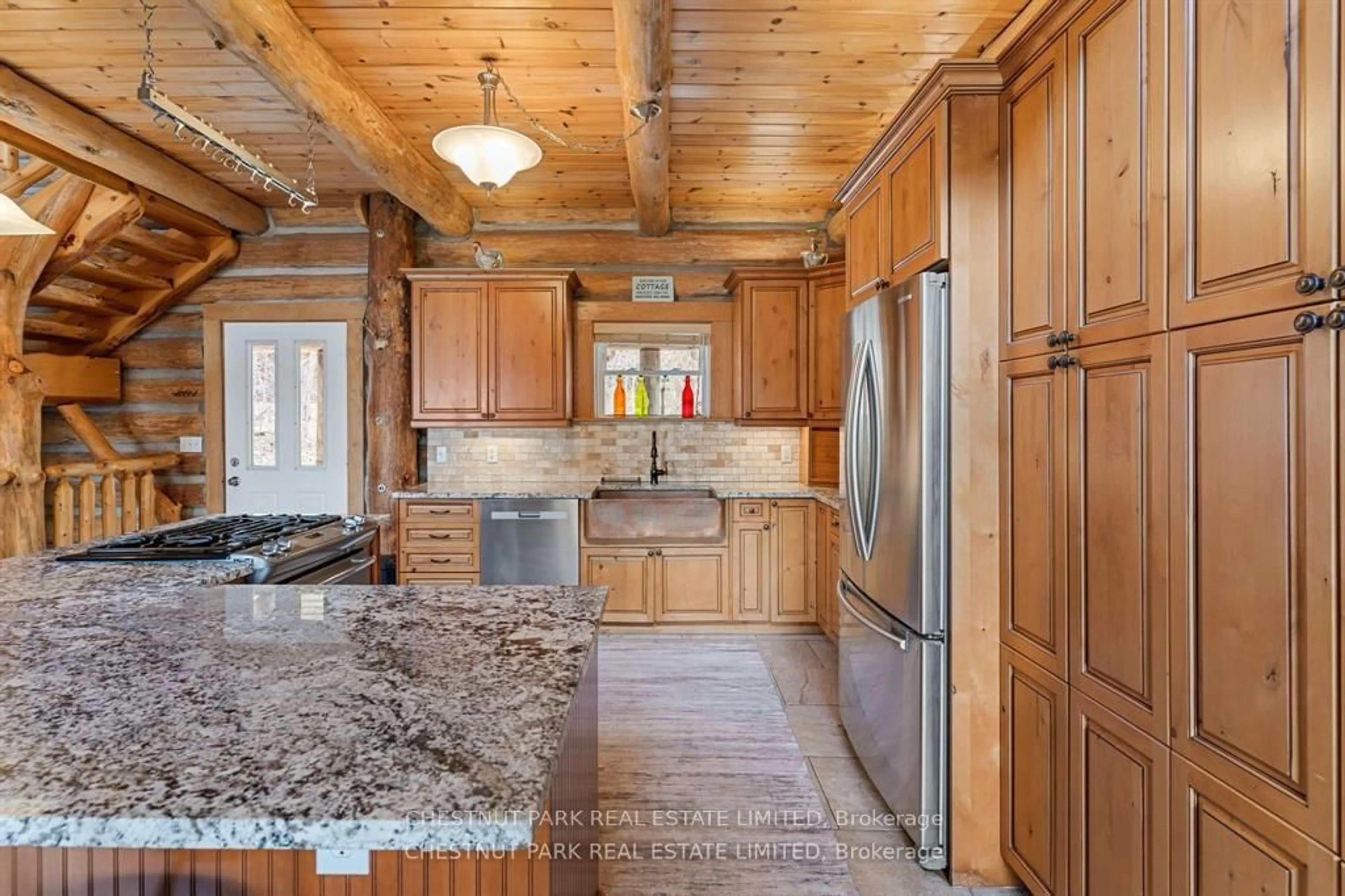 Rustic kitchen, ceramic/tile floor for 1068 Rattlesnake Rd, Dysart et al Ontario K0M 1S0