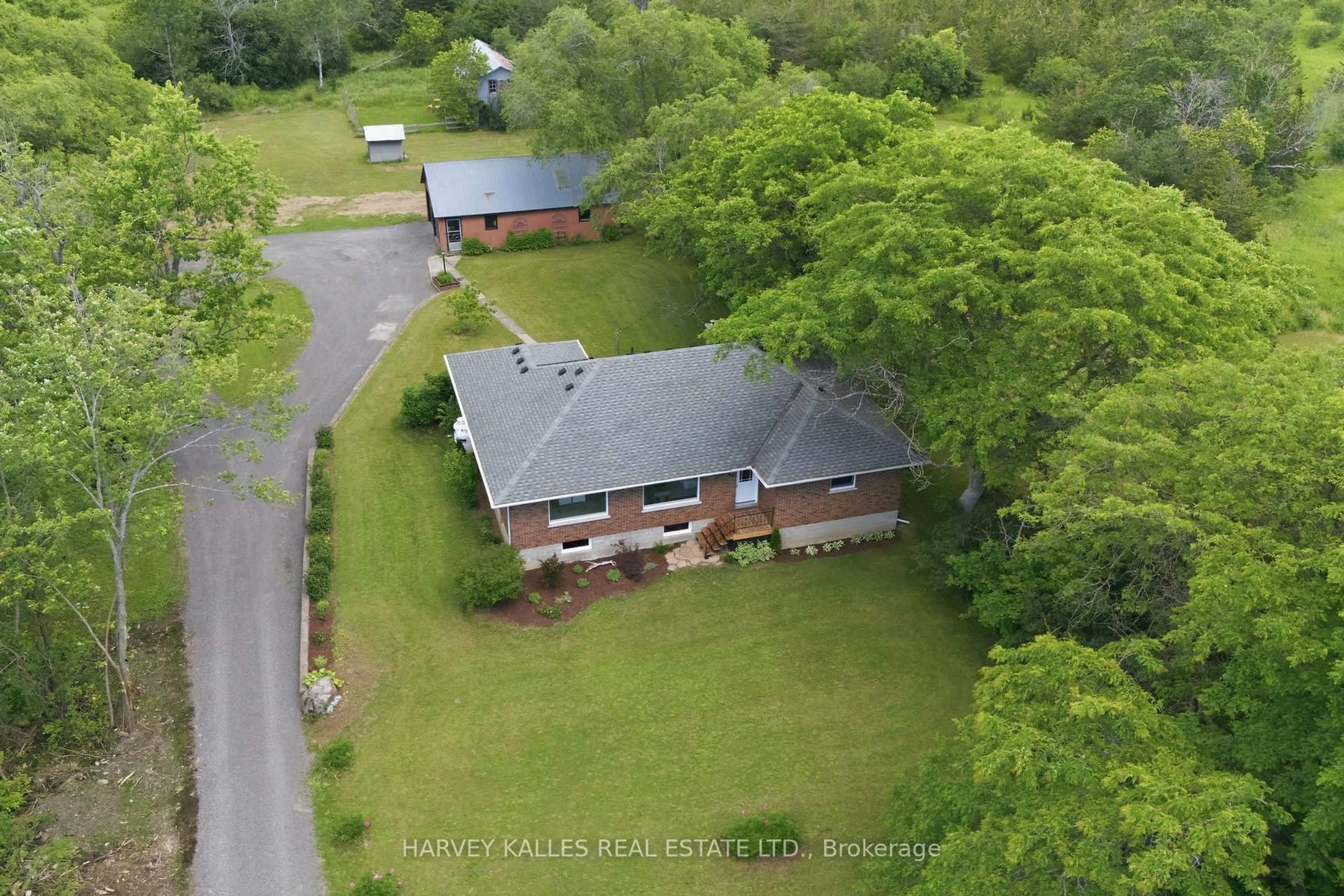 A pic from outside/outdoor area/front of a property/back of a property/a pic from drone, unknown for 511 County Road 8, Prince Edward County Ontario K0K 2T0