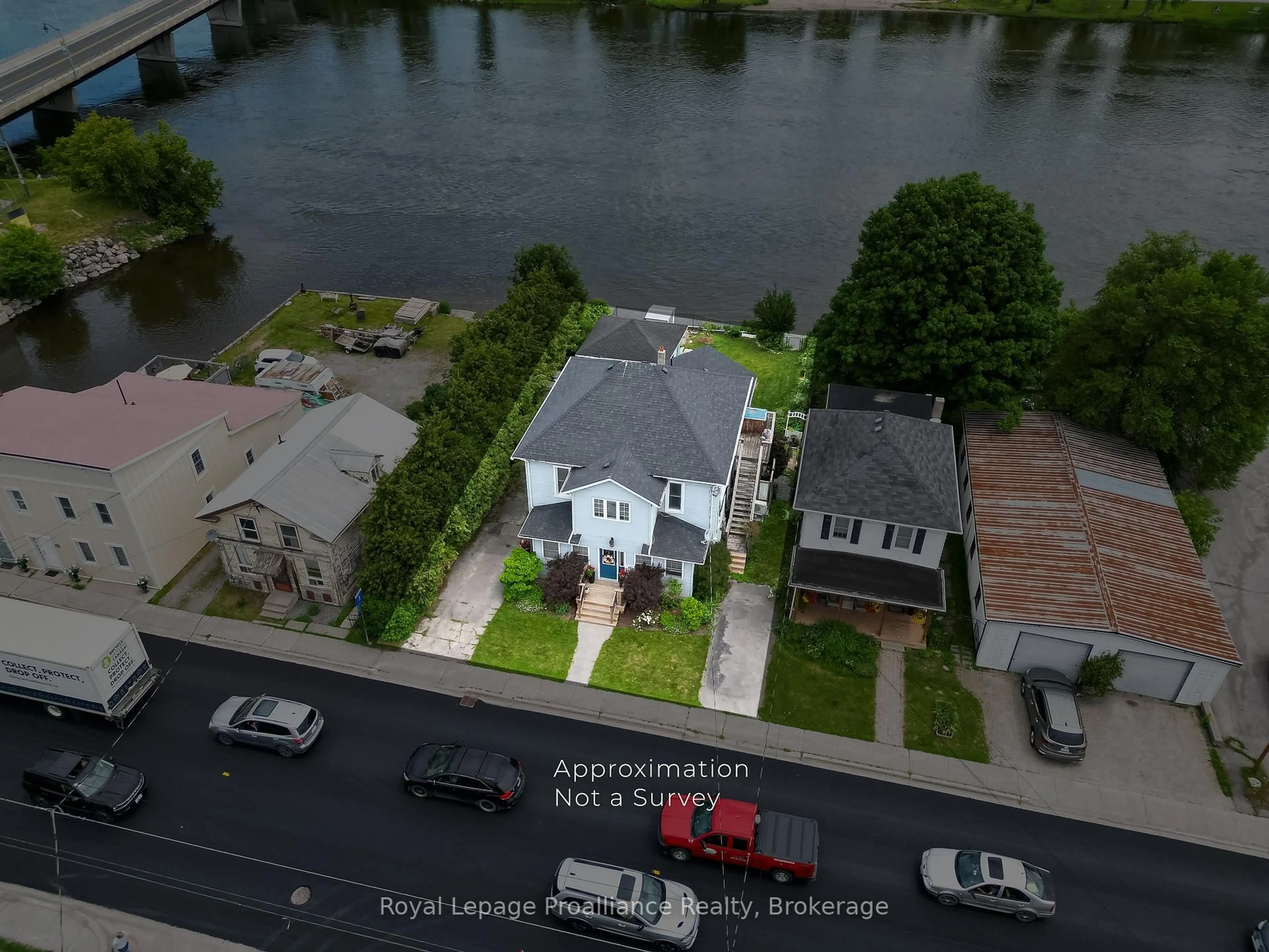 A pic from outside/outdoor area/front of a property/back of a property/a pic from drone, water/lake/river/ocean view for 13 South Trent St, Hastings Ontario K0K 2C0