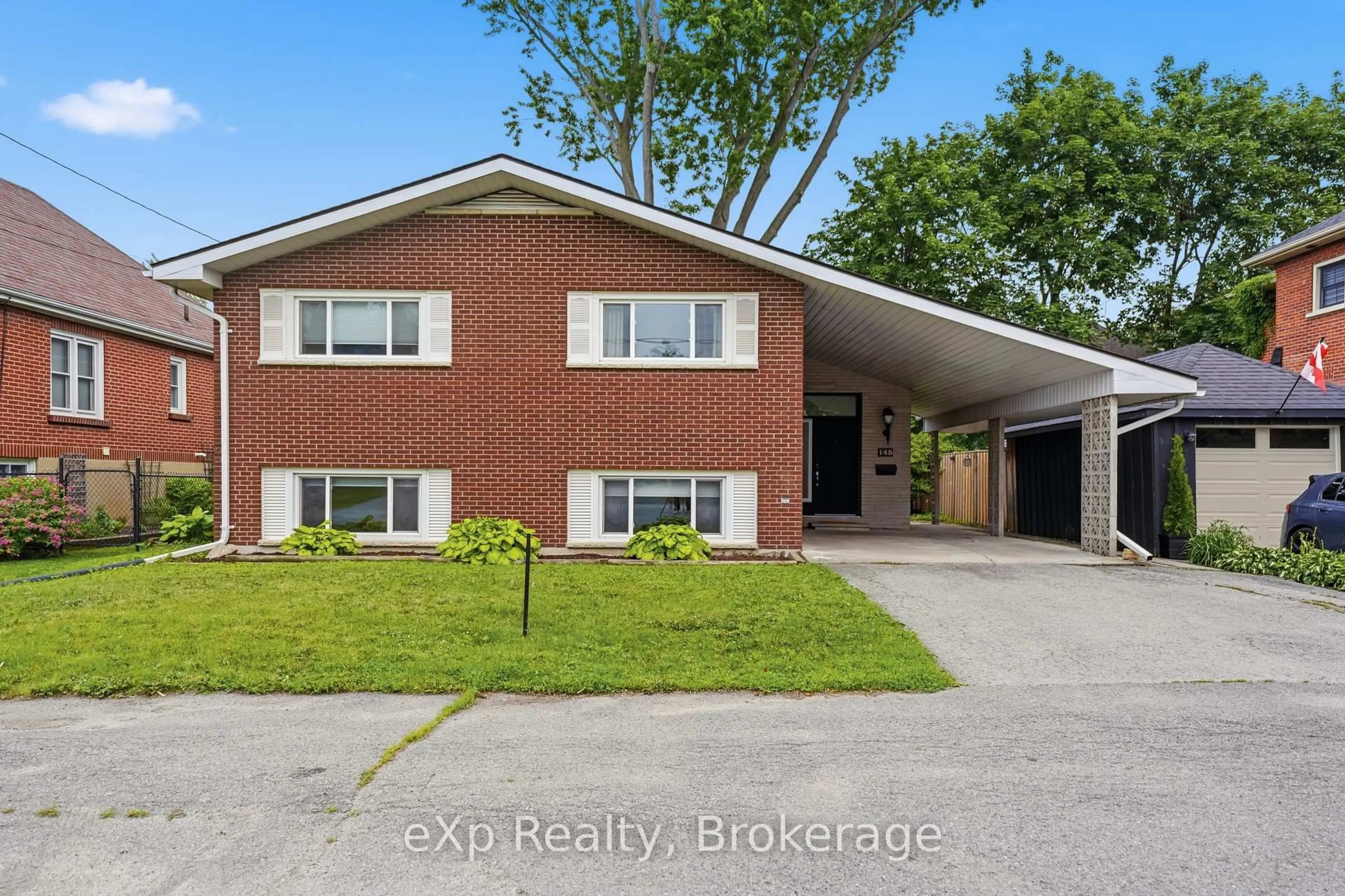 Home with brick exterior material, street for 145 Queen St, Belleville Ontario K8N 1V9
