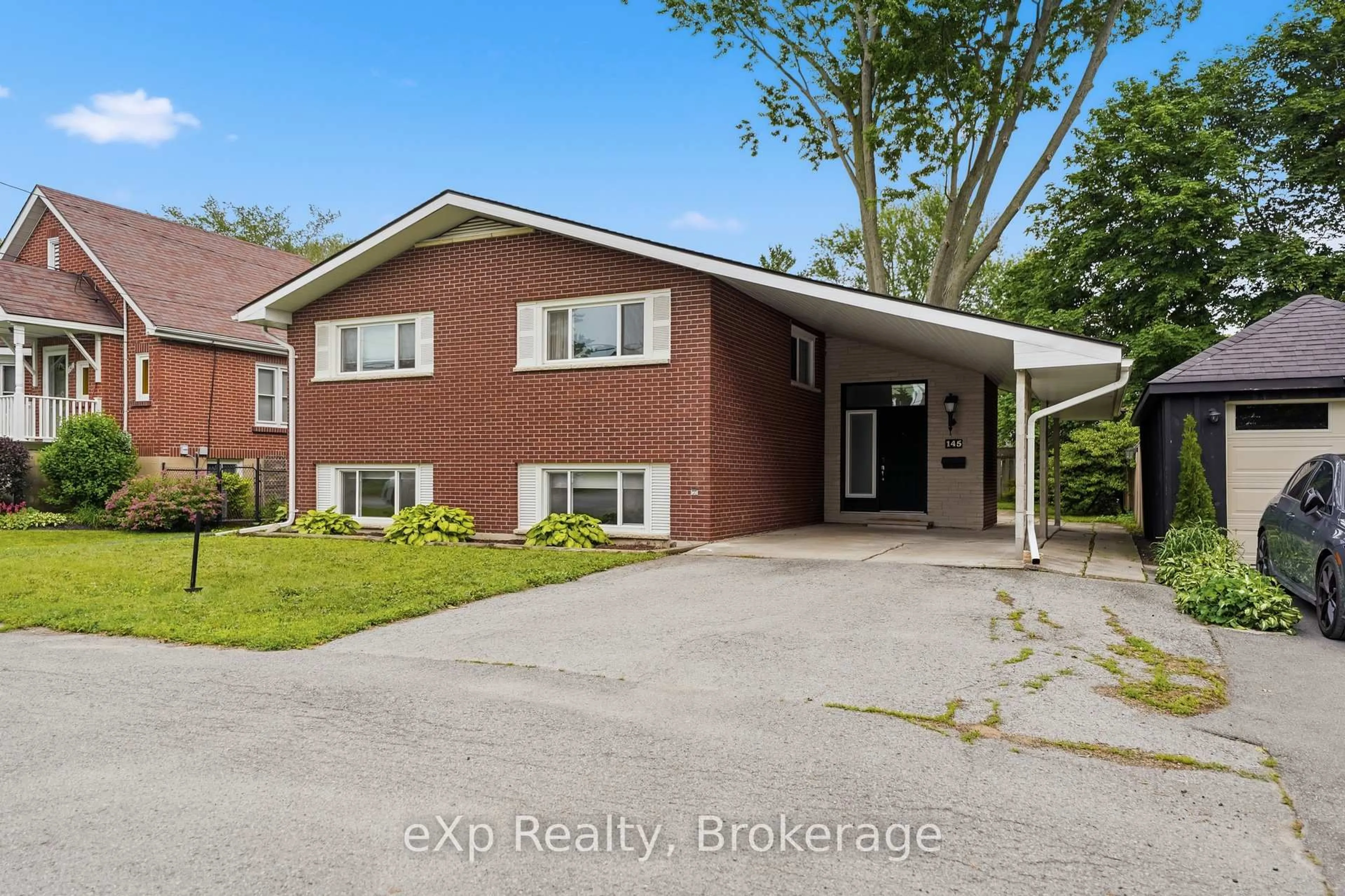 Home with brick exterior material, street for 145 Queen St, Belleville Ontario K8N 1V9
