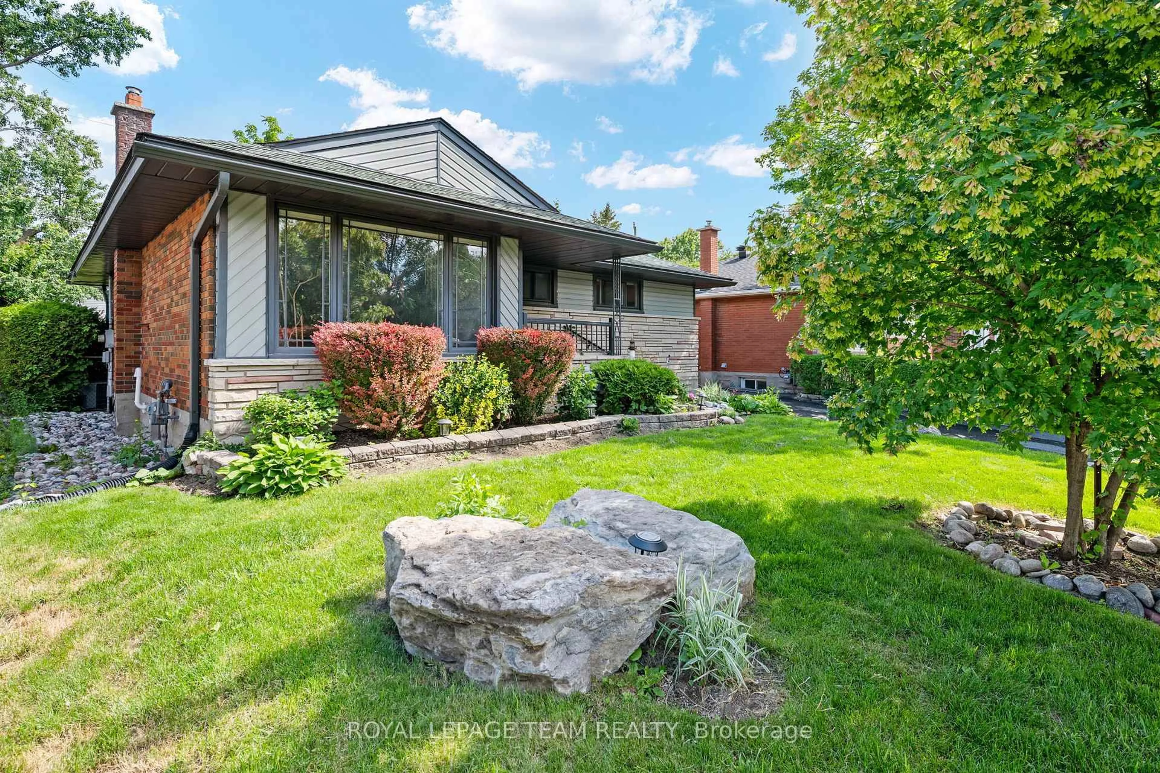 Home with brick exterior material, street for 879 PLEASANT PARK Rd, Ottawa Ontario K1G 1Z1