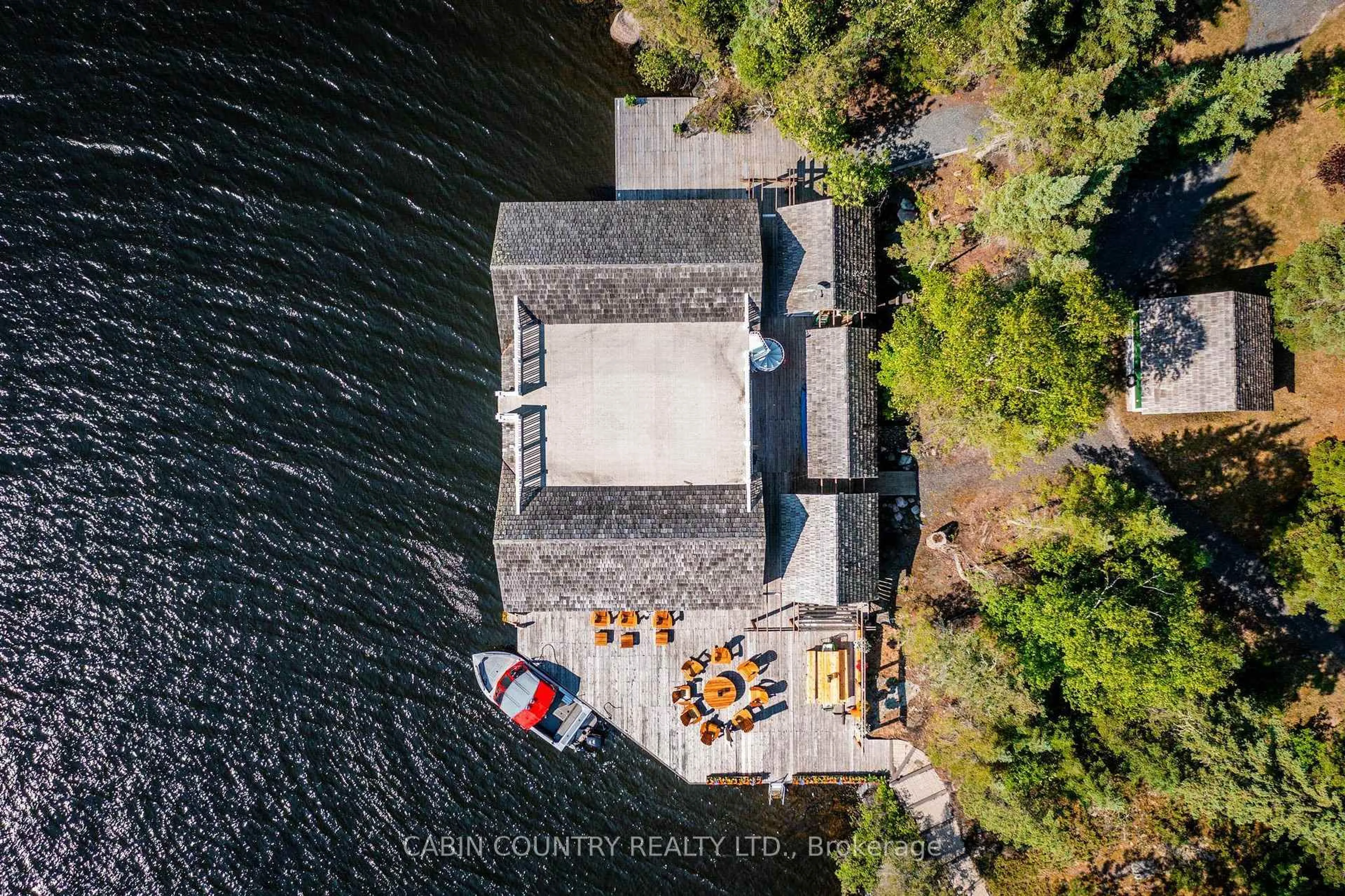 A pic from outside/outdoor area/front of a property/back of a property/a pic from drone, water/lake/river/ocean view for 295P Rogers Island, Kenora Remote Area Ontario P0X 1C0
