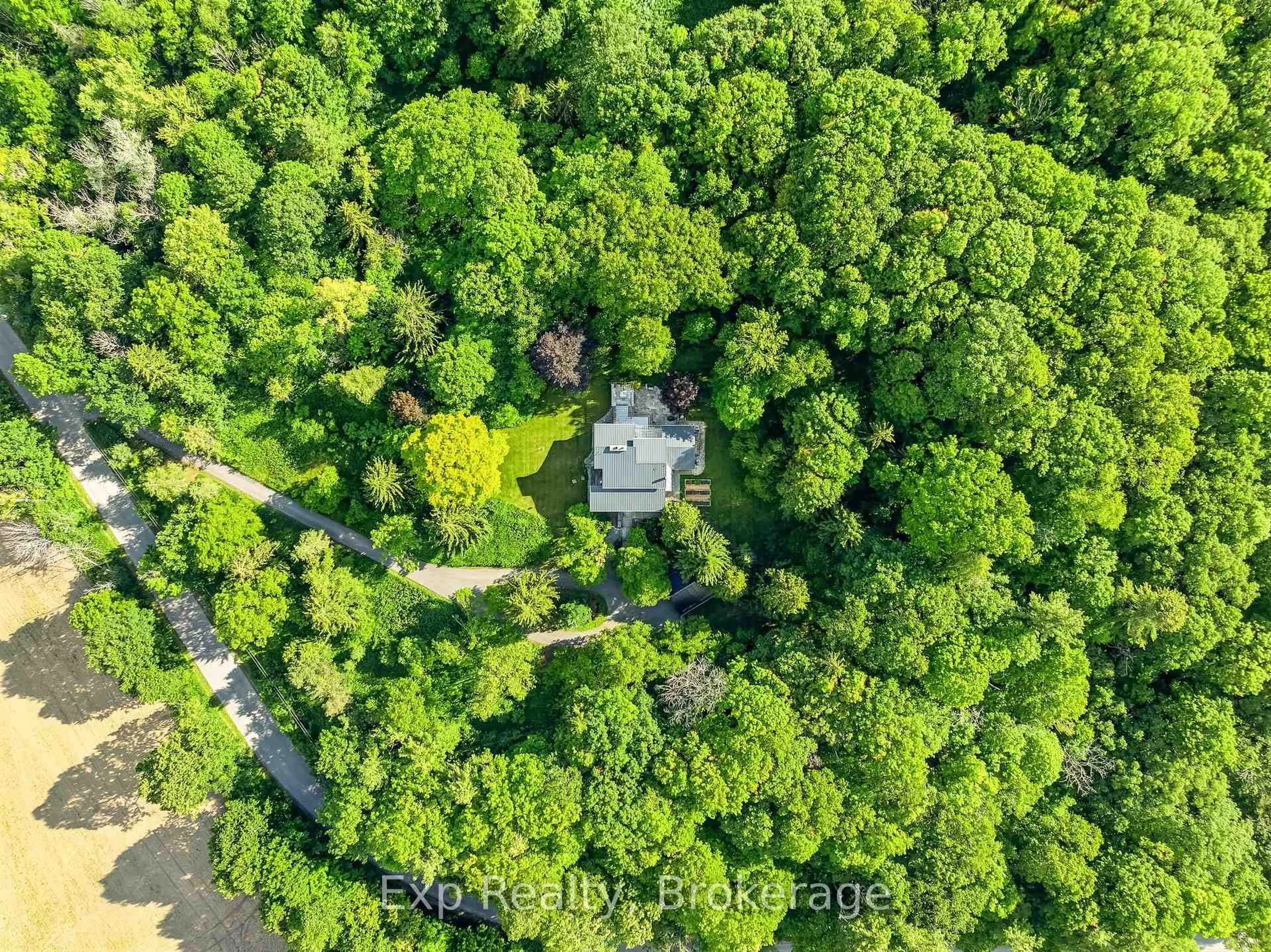 A pic from outside/outdoor area/front of a property/back of a property/a pic from drone, forest/trees view for 3282 Williamson Rd, Hamilton Township Ontario K9A 4J7