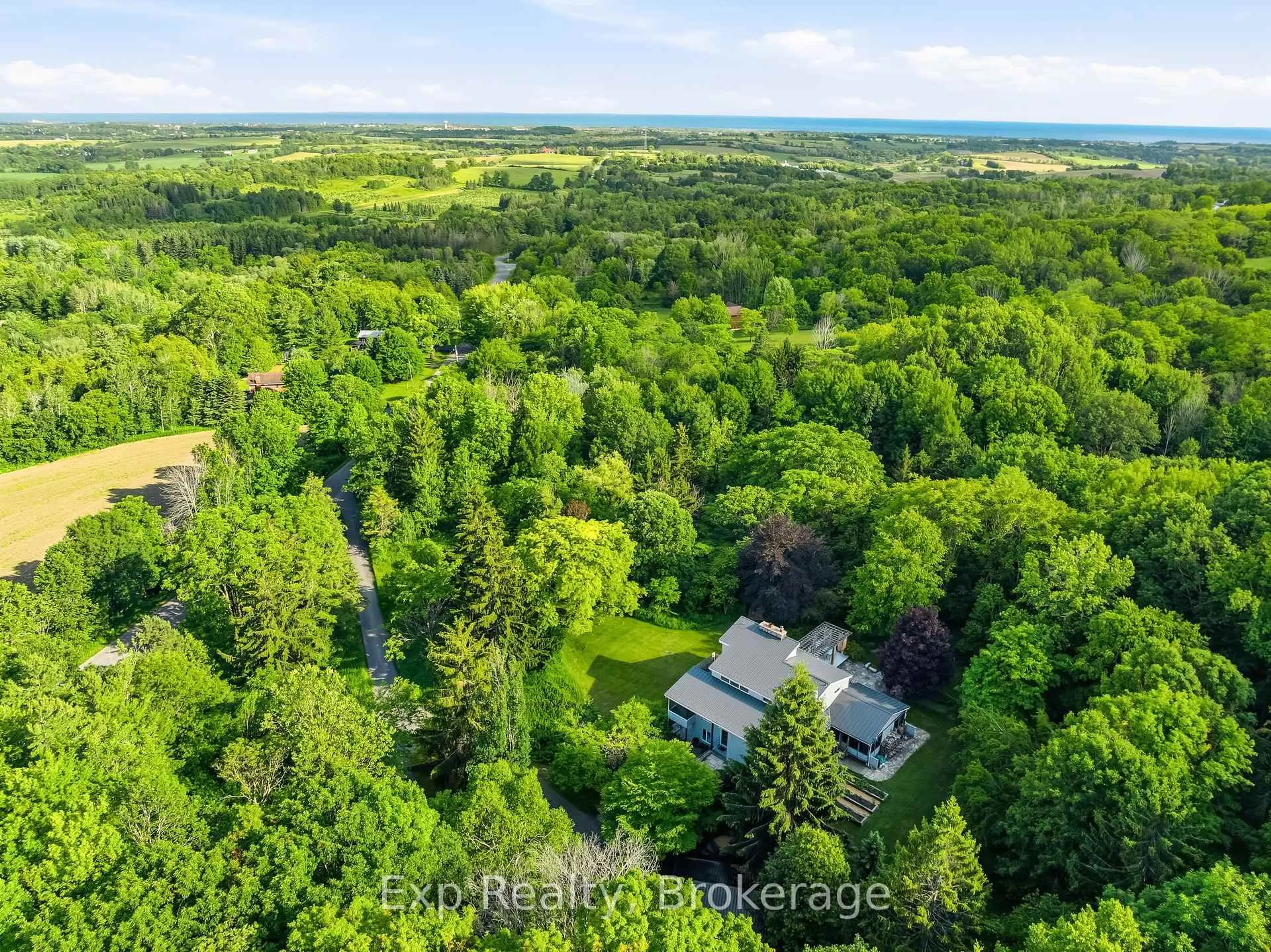 A pic from outside/outdoor area/front of a property/back of a property/a pic from drone, forest/trees view for 3282 Williamson Rd, Hamilton Township Ontario K9A 4J7