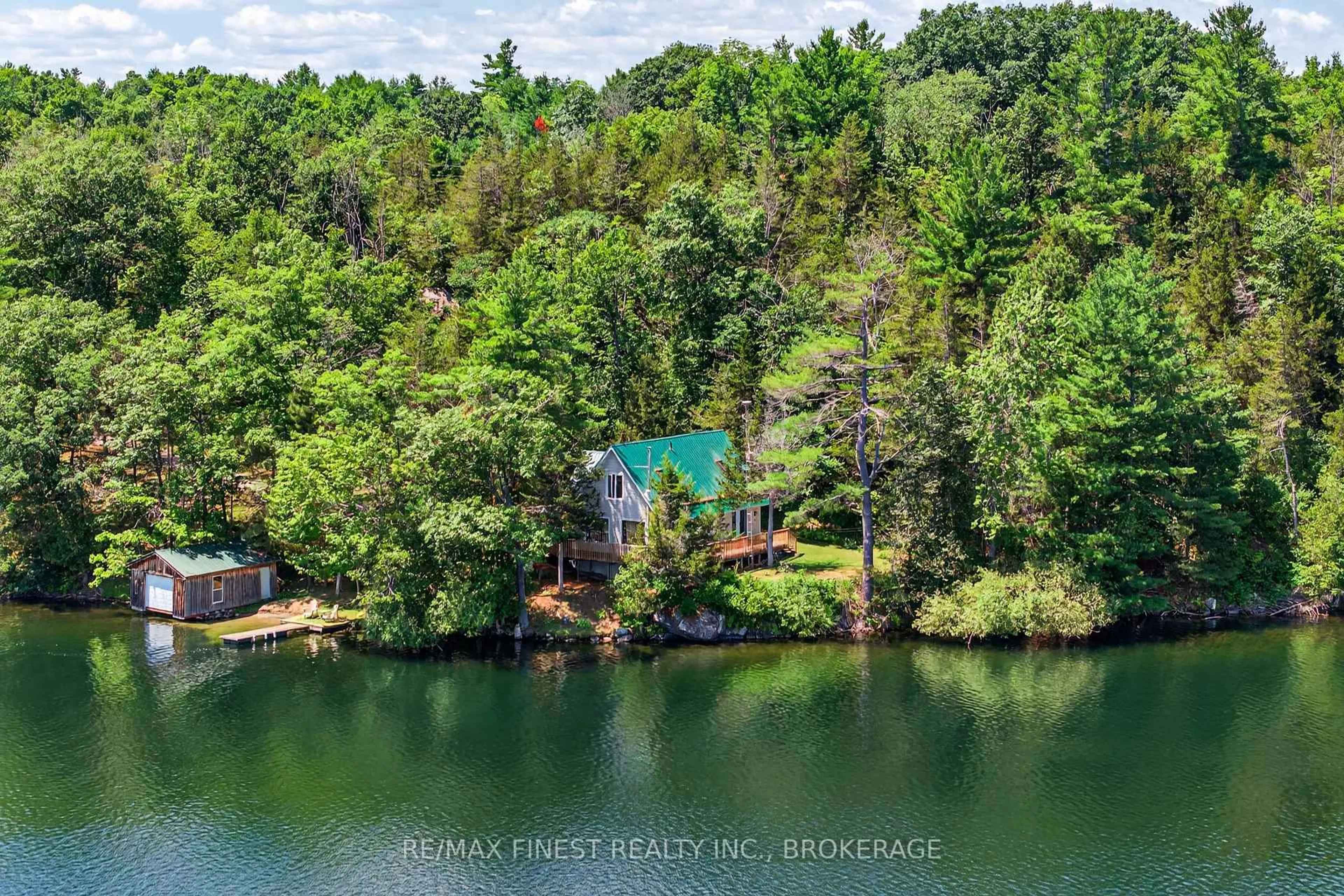 A pic from outside/outdoor area/front of a property/back of a property/a pic from drone, water/lake/river/ocean view for 1076 Chester Lane, Hartington Ontario K0H 1W0