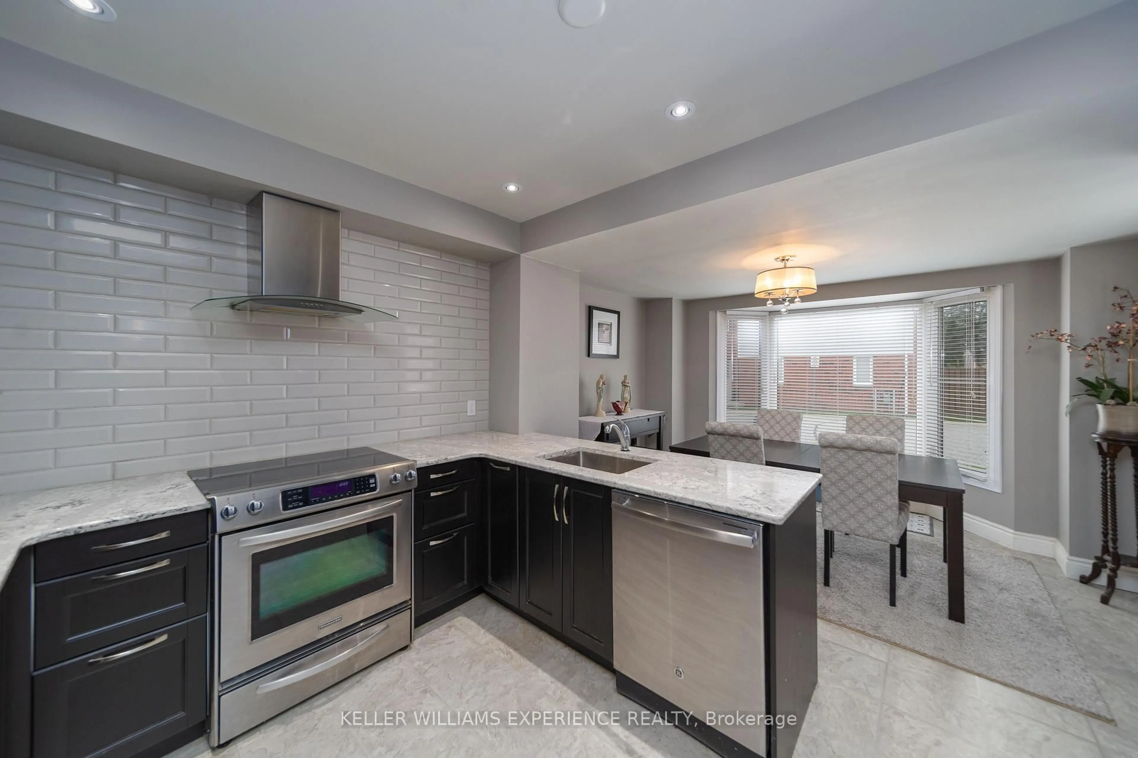 Open concept kitchen, ceramic/tile floor for 63 Shoreline Dr, Bracebridge Ontario P1L 1Z3