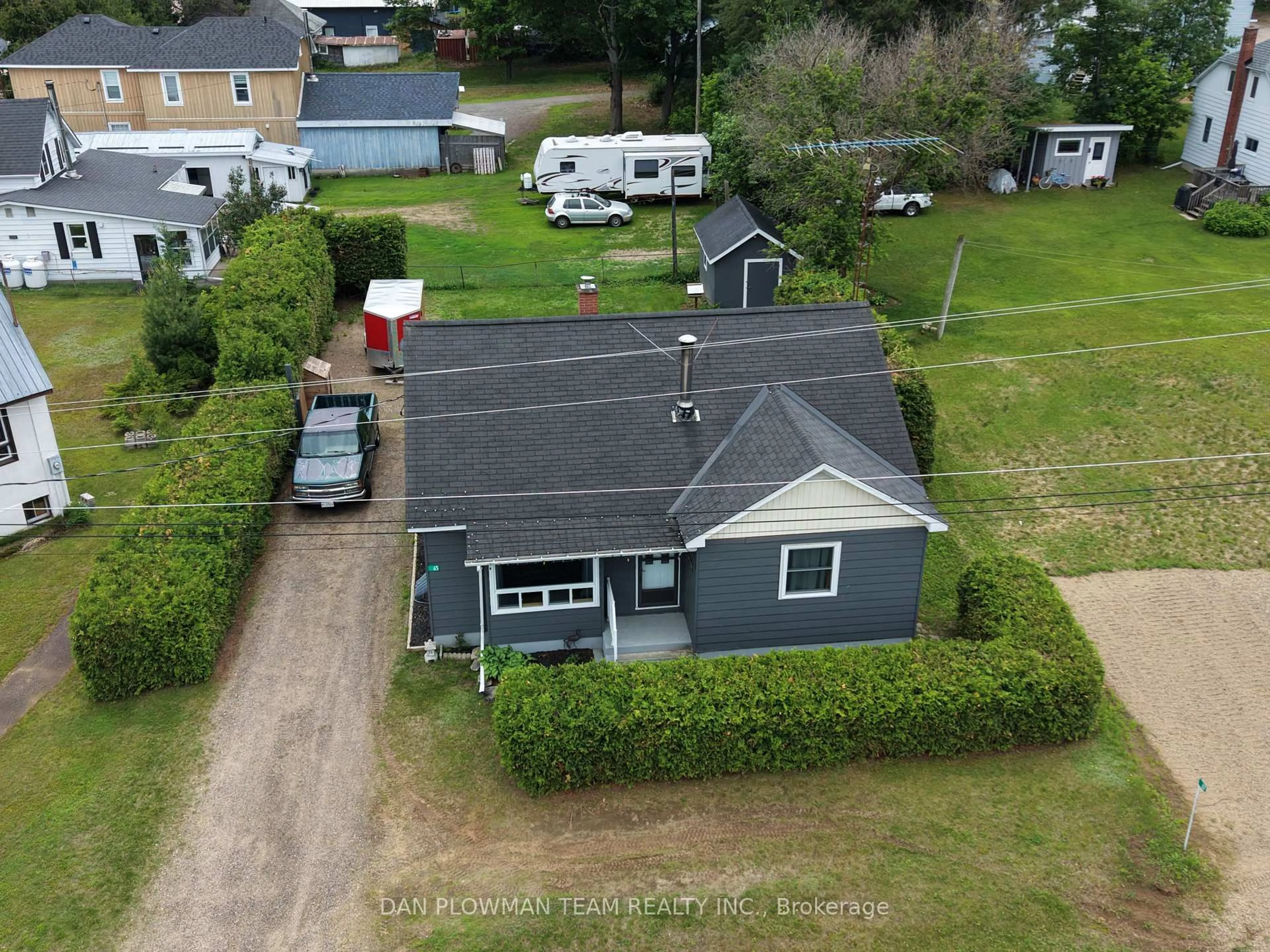 A pic from outside/outdoor area/front of a property/back of a property/a pic from drone, street for 65 Inglis St, Whitney Ontario K0J 2M0