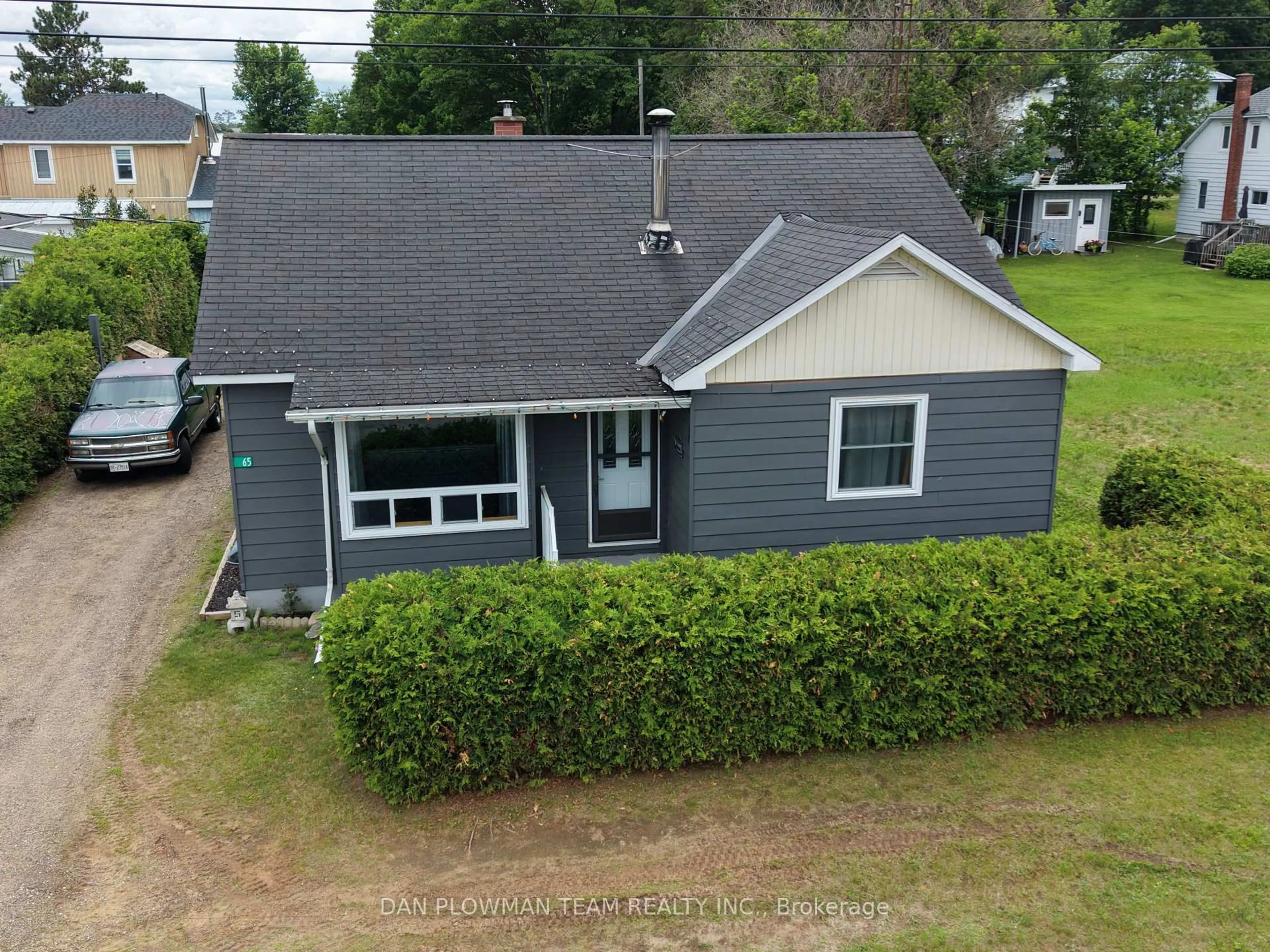 A pic from outside/outdoor area/front of a property/back of a property/a pic from drone, street for 65 Inglis St, Whitney Ontario K0J 2M0