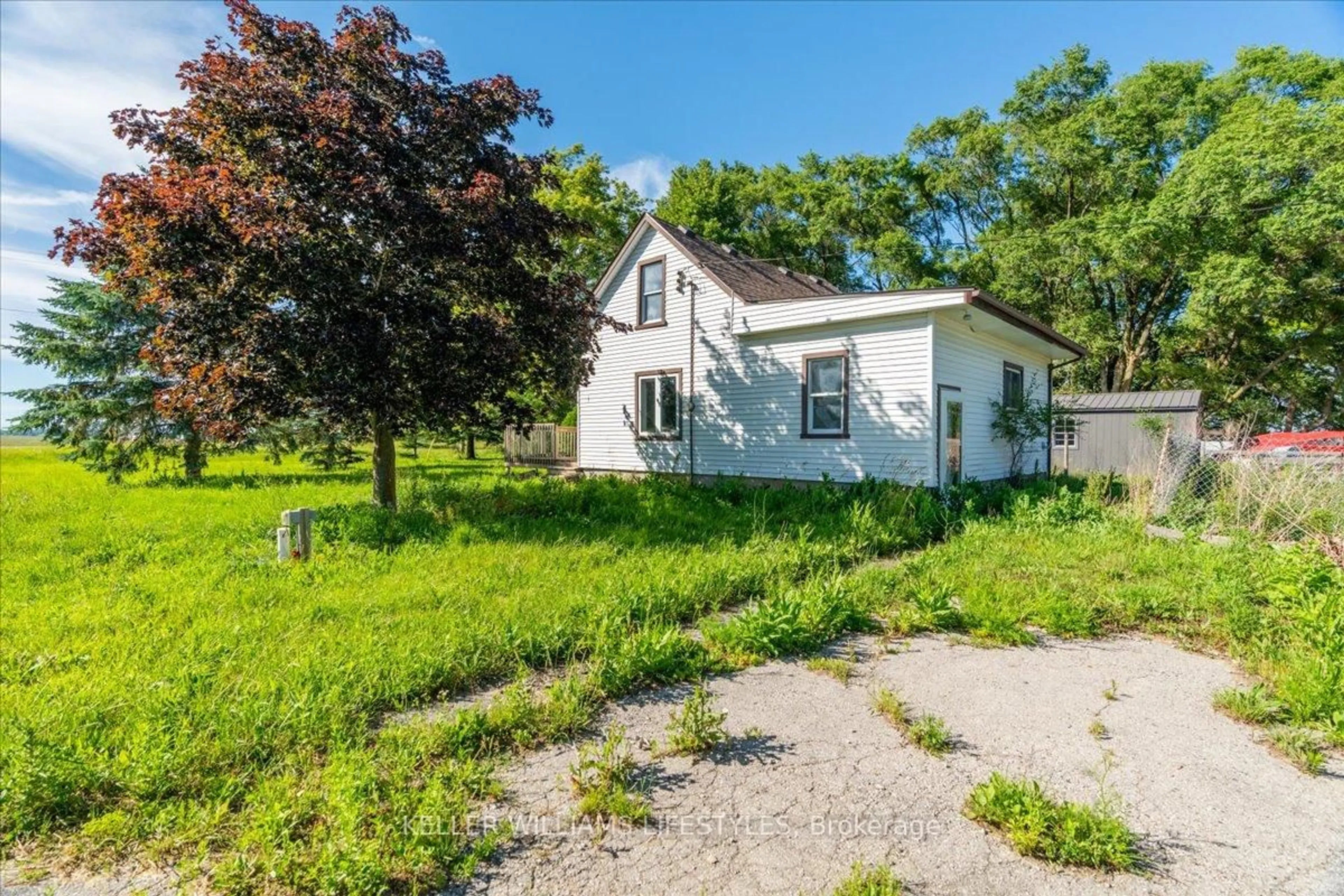 A pic from outside/outdoor area/front of a property/back of a property/a pic from drone, street for 6079 Longwoods Rd, Southwest Middlesex Ontario N0L 1T0