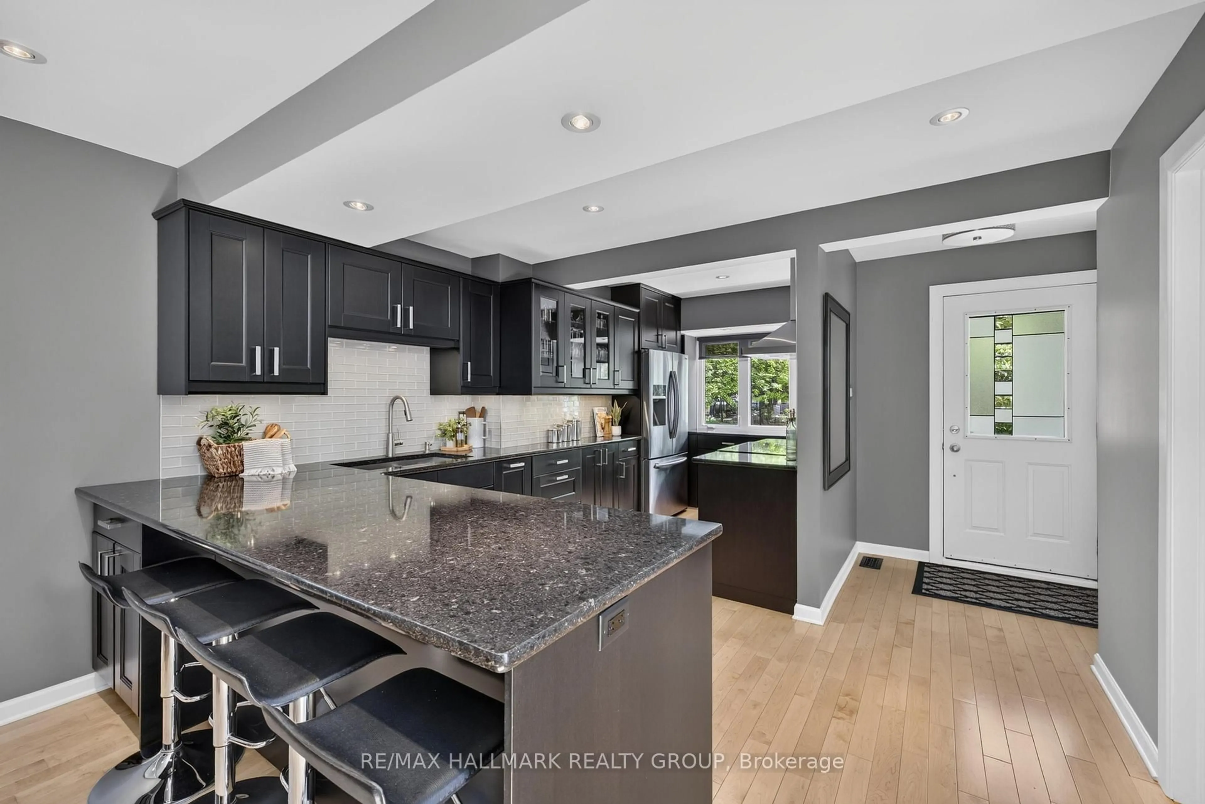 Open concept kitchen, ceramic/tile floor for 1265 Coldrey Ave, Ottawa Ontario K1Z 7P6