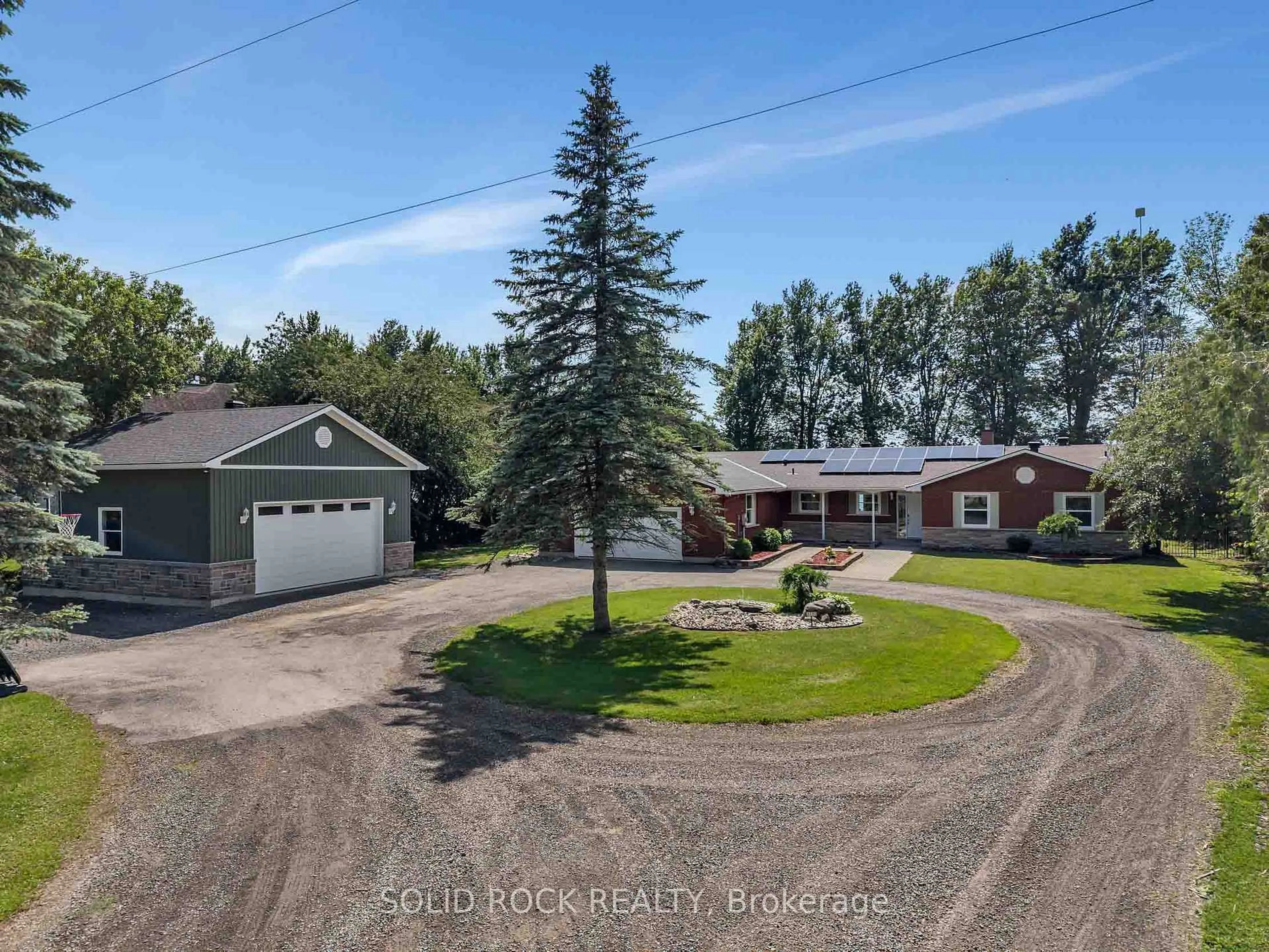 A pic from outside/outdoor area/front of a property/back of a property/a pic from drone, unknown for 3710 River Rd, North Grenville Ontario K4M 1B4