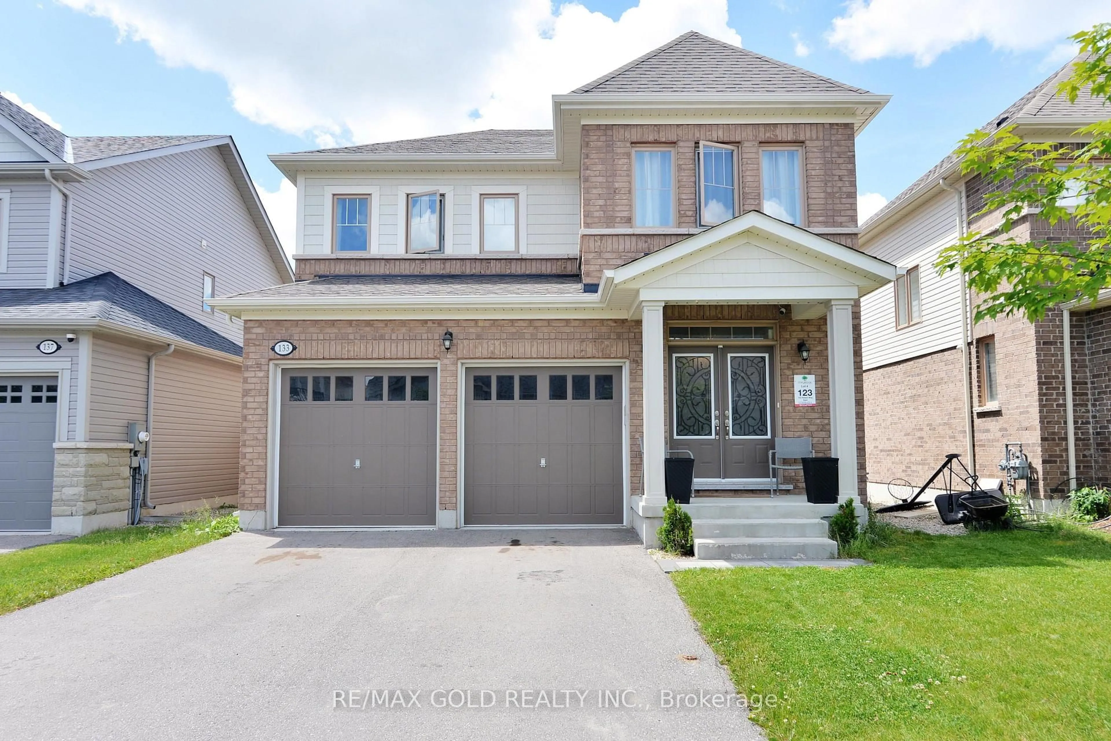 Home with brick exterior material, street for 133 Harpin Way, Centre Wellington Ontario N1M 0G9
