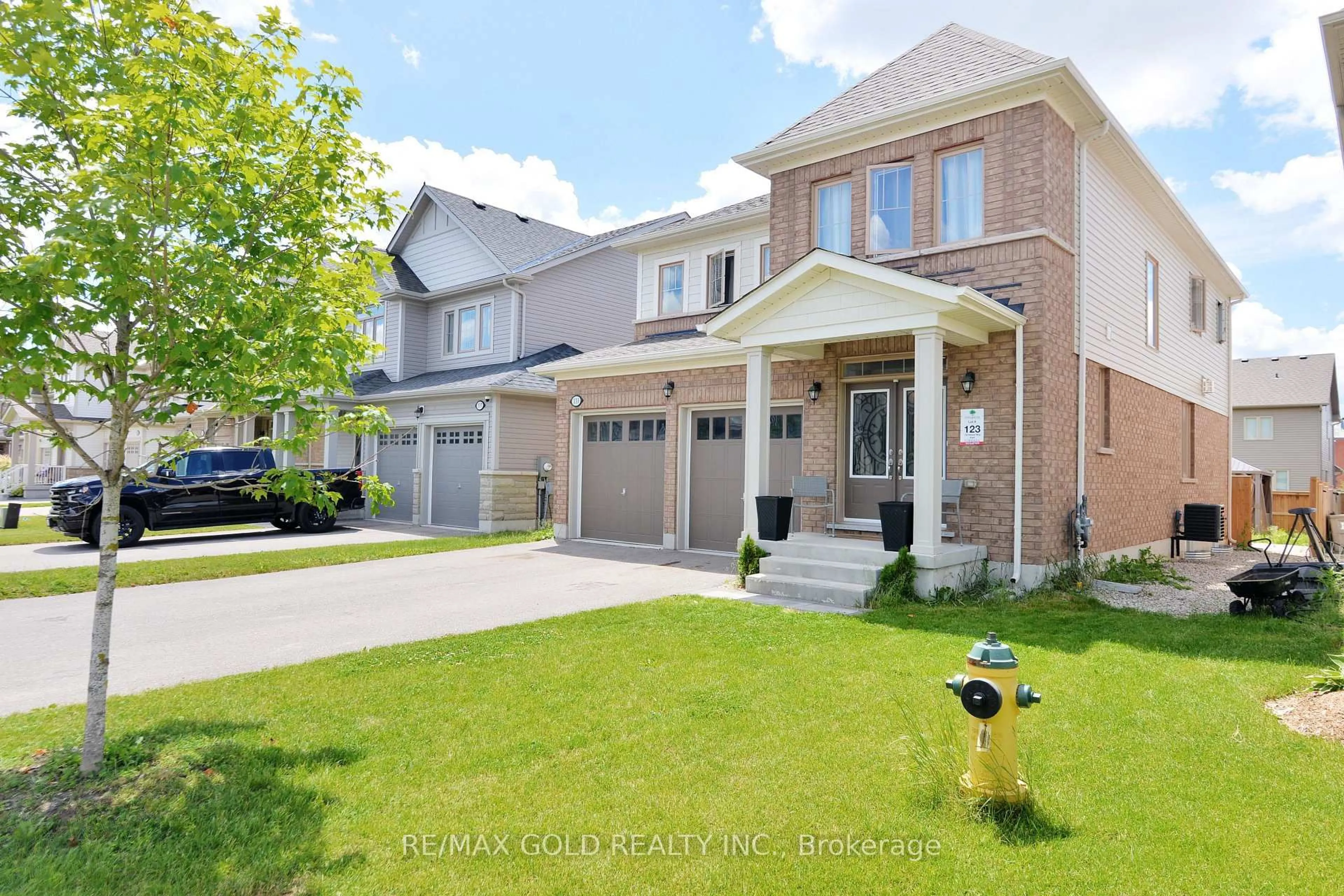 Home with brick exterior material, street for 133 Harpin Way, Centre Wellington Ontario N1M 0G9