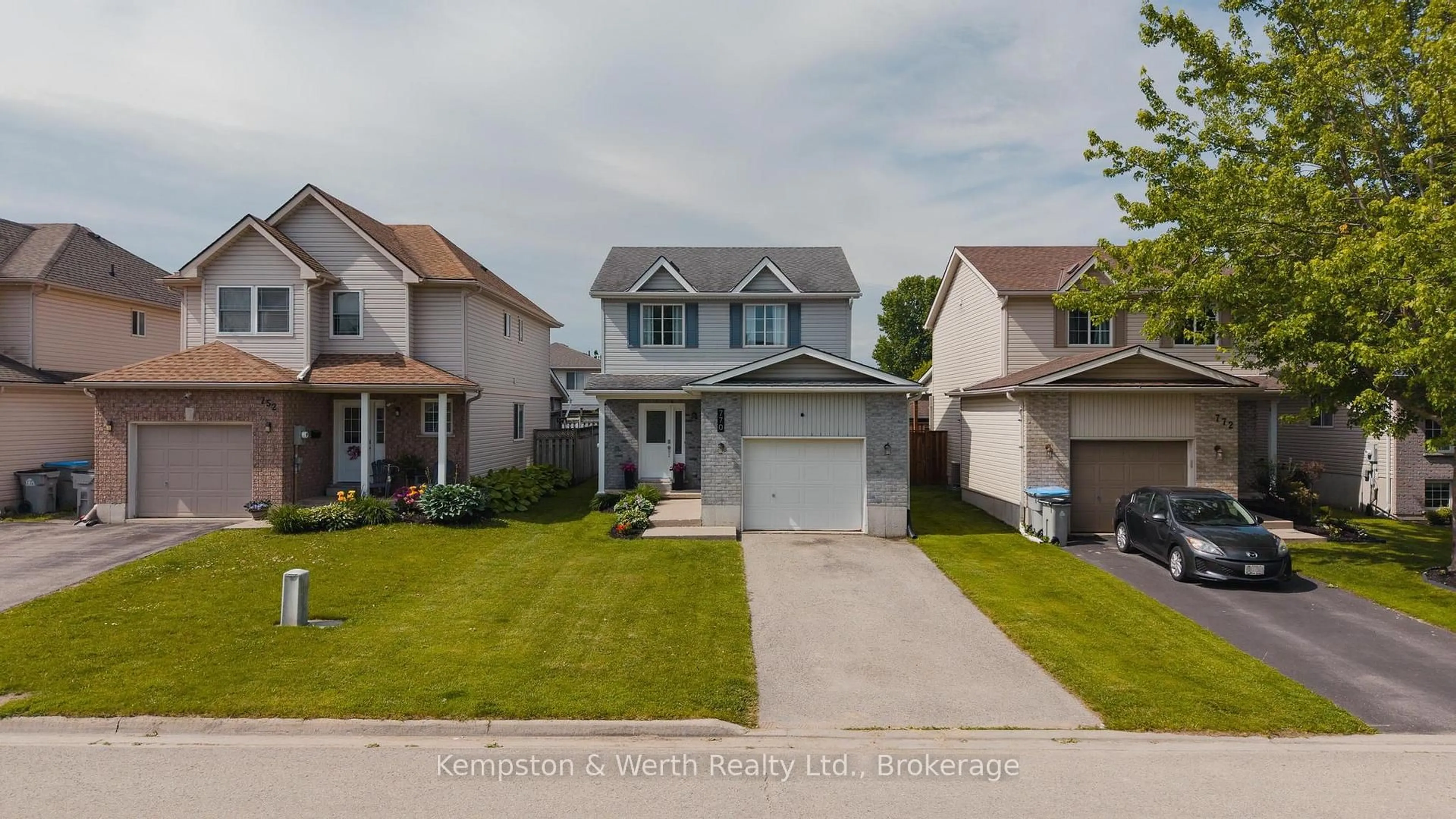 Home with vinyl exterior material, street for 770 Brock St, North Perth Ontario N4W 3T5