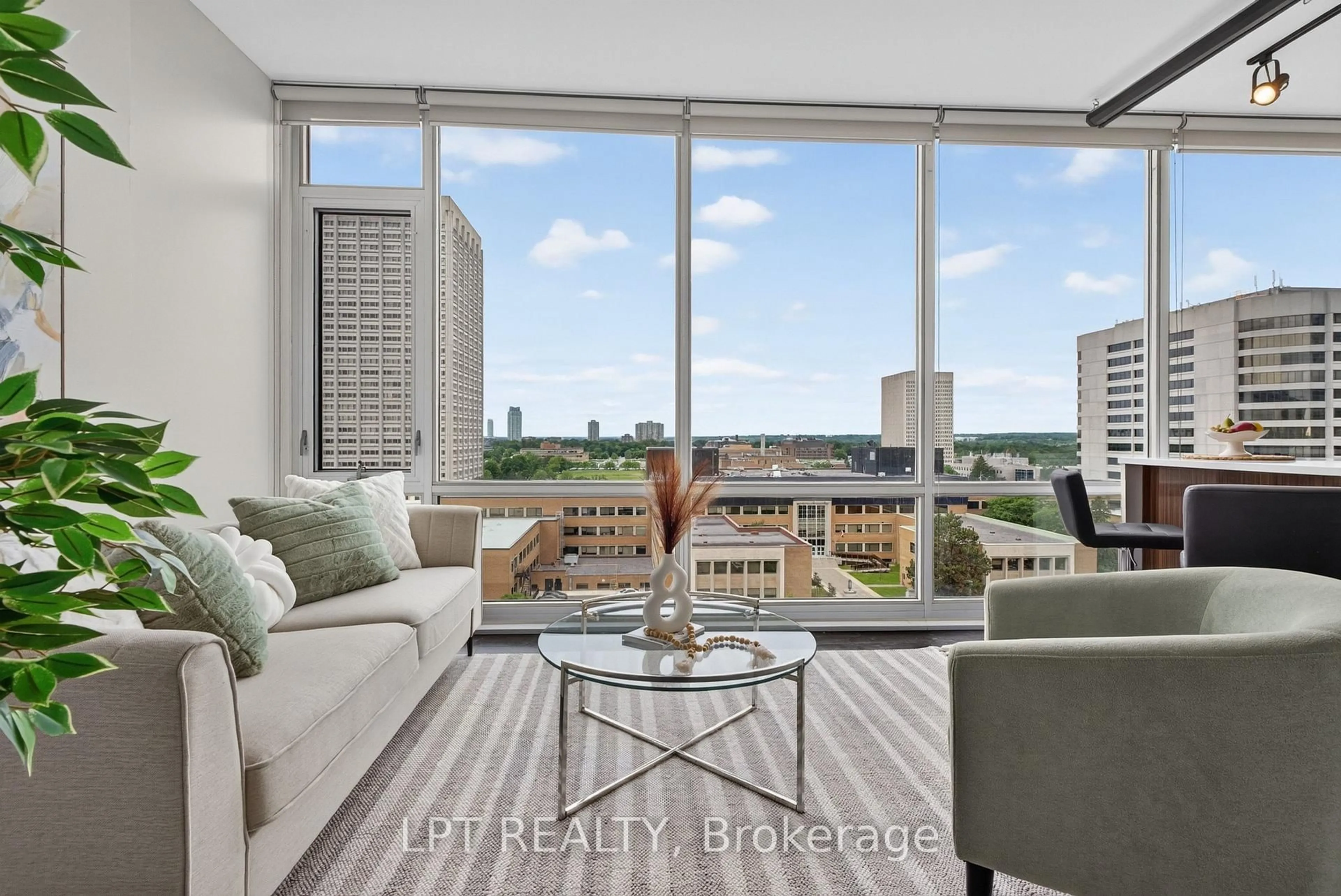 Living room with furniture, unknown for 201 Parkdale Ave #1004, Ottawa Ontario K1Y 1E8