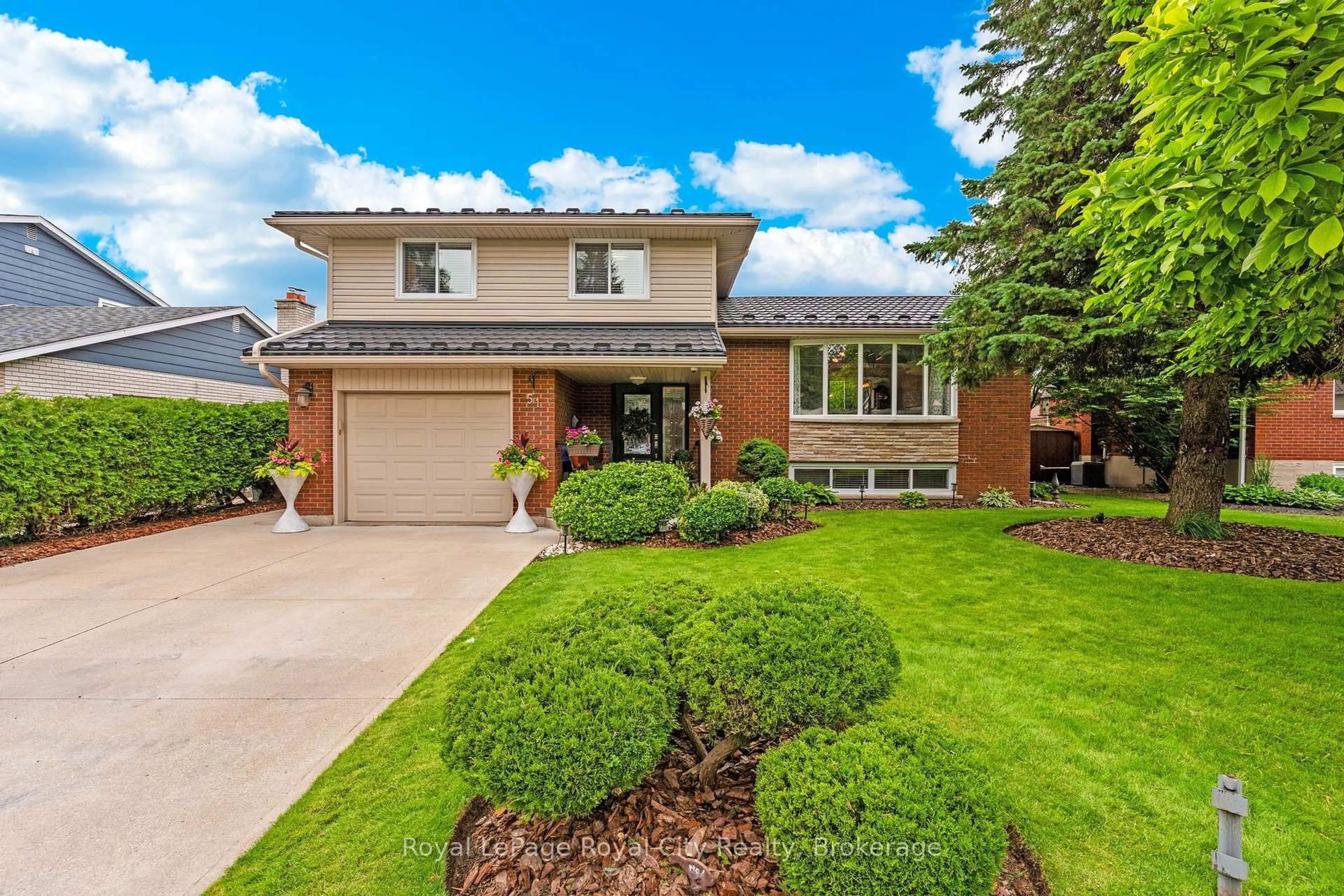 Home with brick exterior material, street for 51 Elginfield Dr, Guelph Ontario N1E 4E5