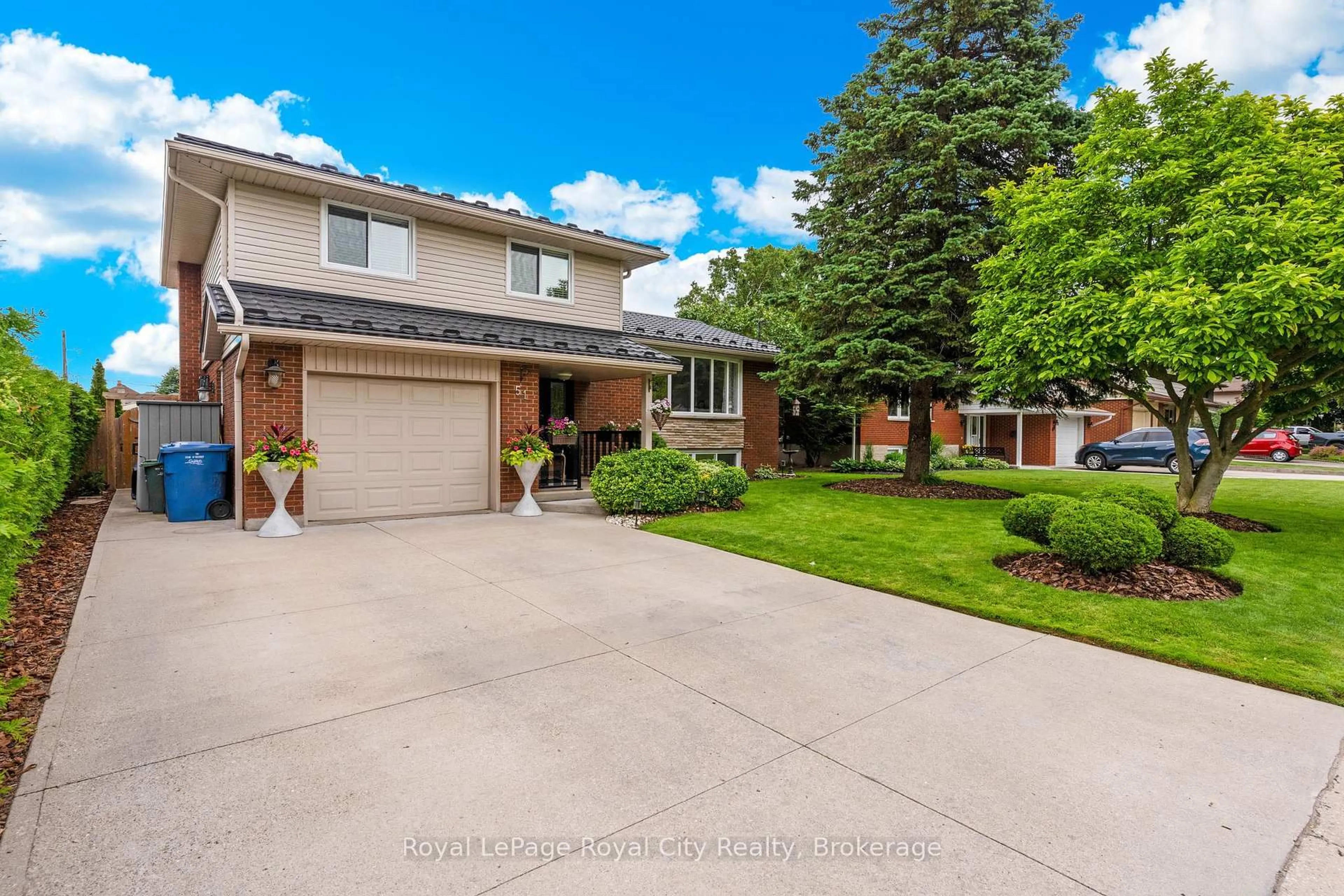 Home with brick exterior material, street for 51 Elginfield Dr, Guelph Ontario N1E 4E5
