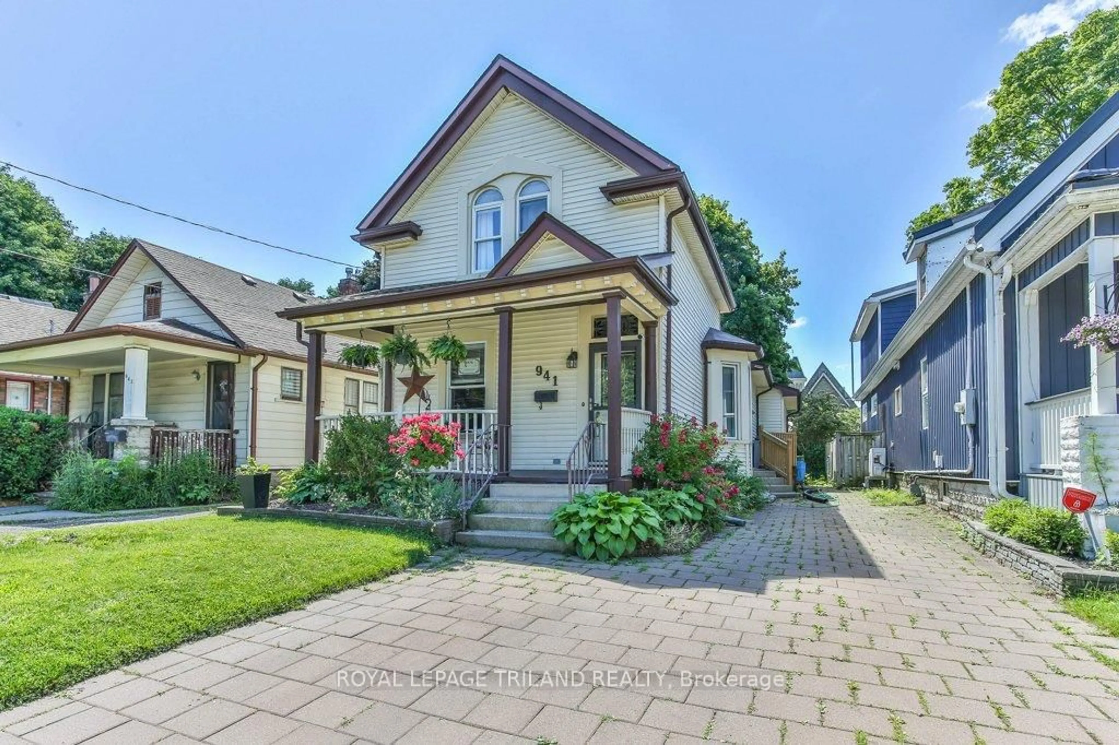 Home with brick exterior material, street for 941 QUEENS Ave, London East Ontario N5W 3H9