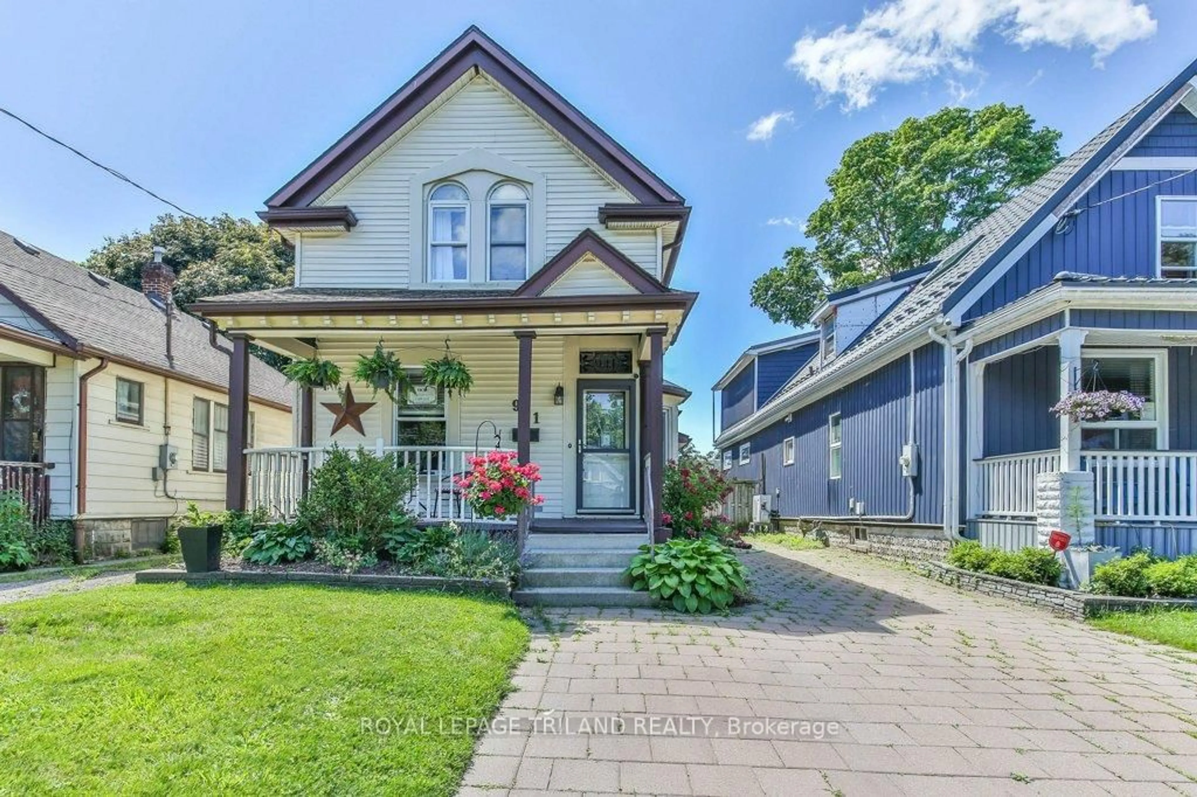 Home with brick exterior material, street for 941 QUEENS Ave, London East Ontario N5W 3H9