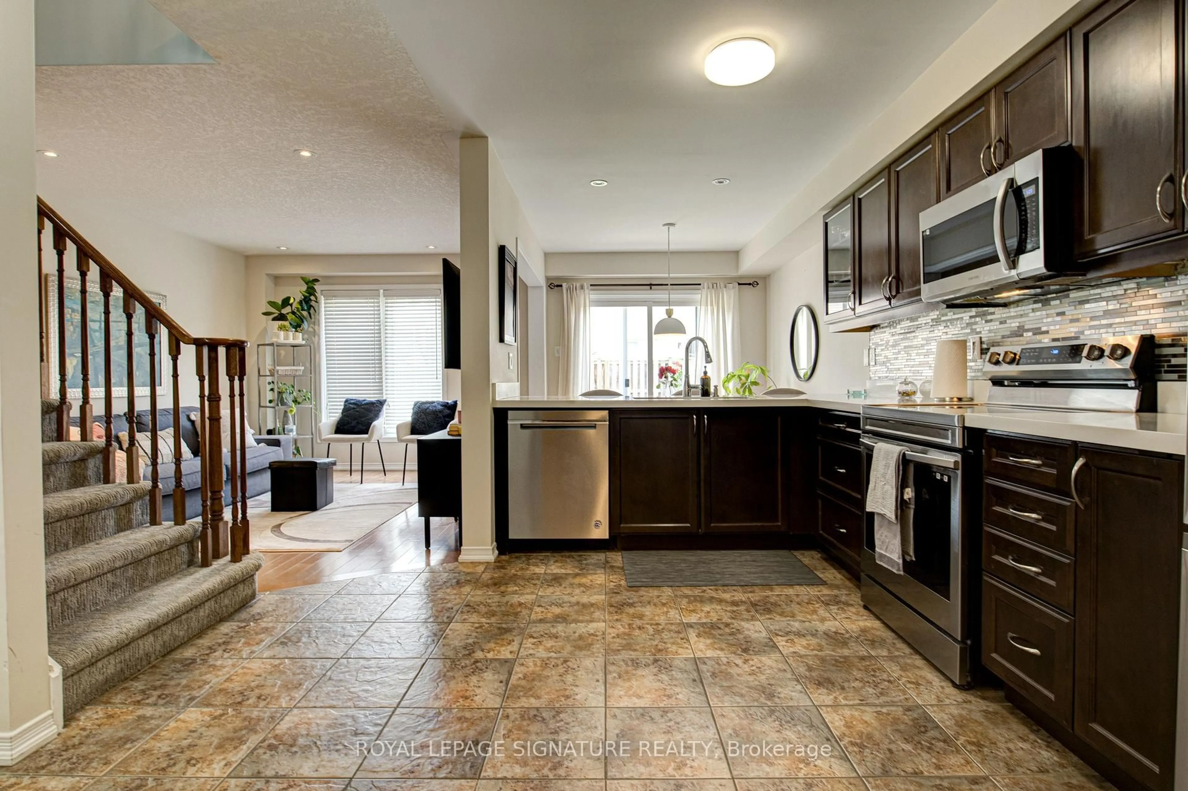 Open concept kitchen, ceramic/tile floor for 39 Trowbridge St, Woolwich Ontario N0B 1M0