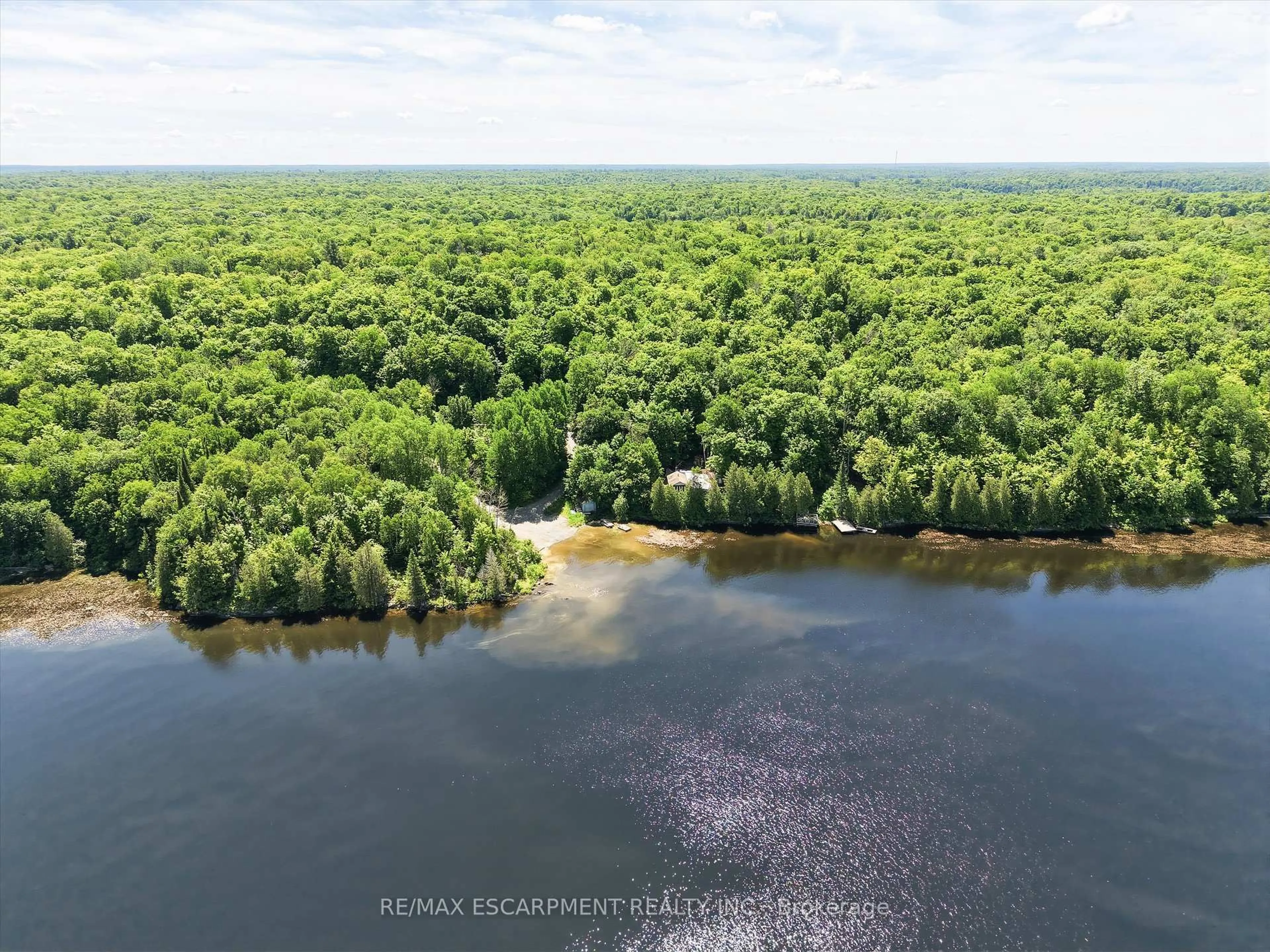 A pic from outside/outdoor area/front of a property/back of a property/a pic from drone, water/lake/river/ocean view for 1700 Lorimer Lake Rd, Whitestone Ontario P0A 1G0