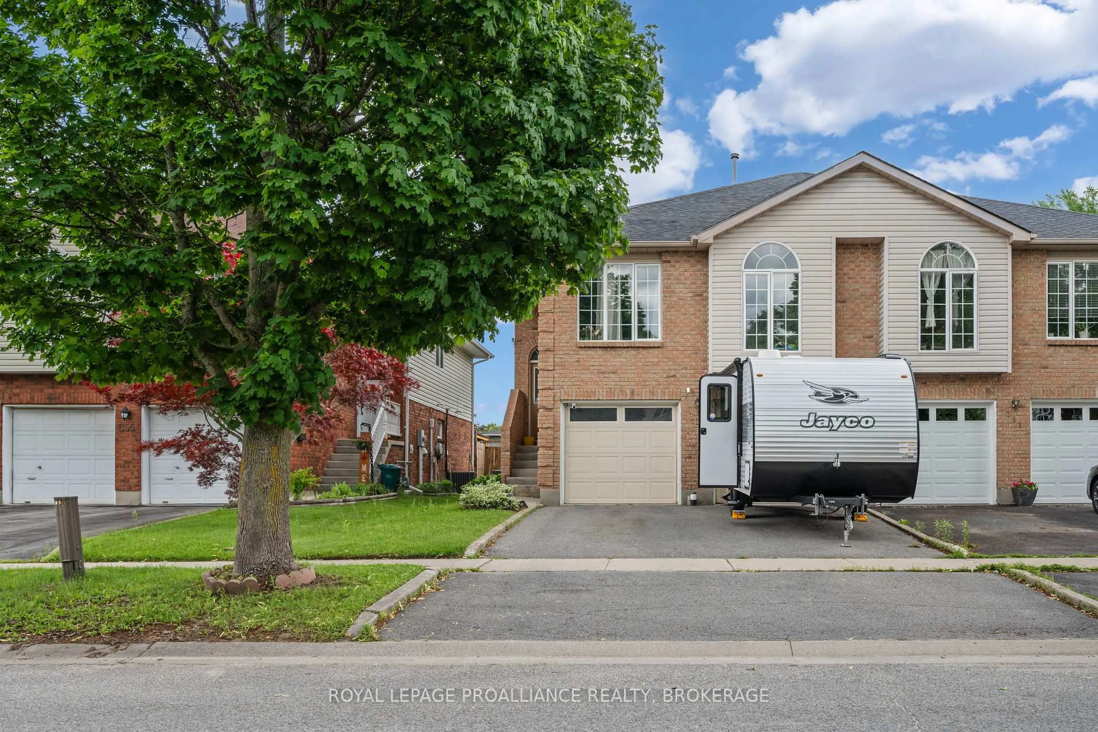Home with vinyl exterior material, street for 653 Barnsley Cres, Kingston Ontario K7M 8X4