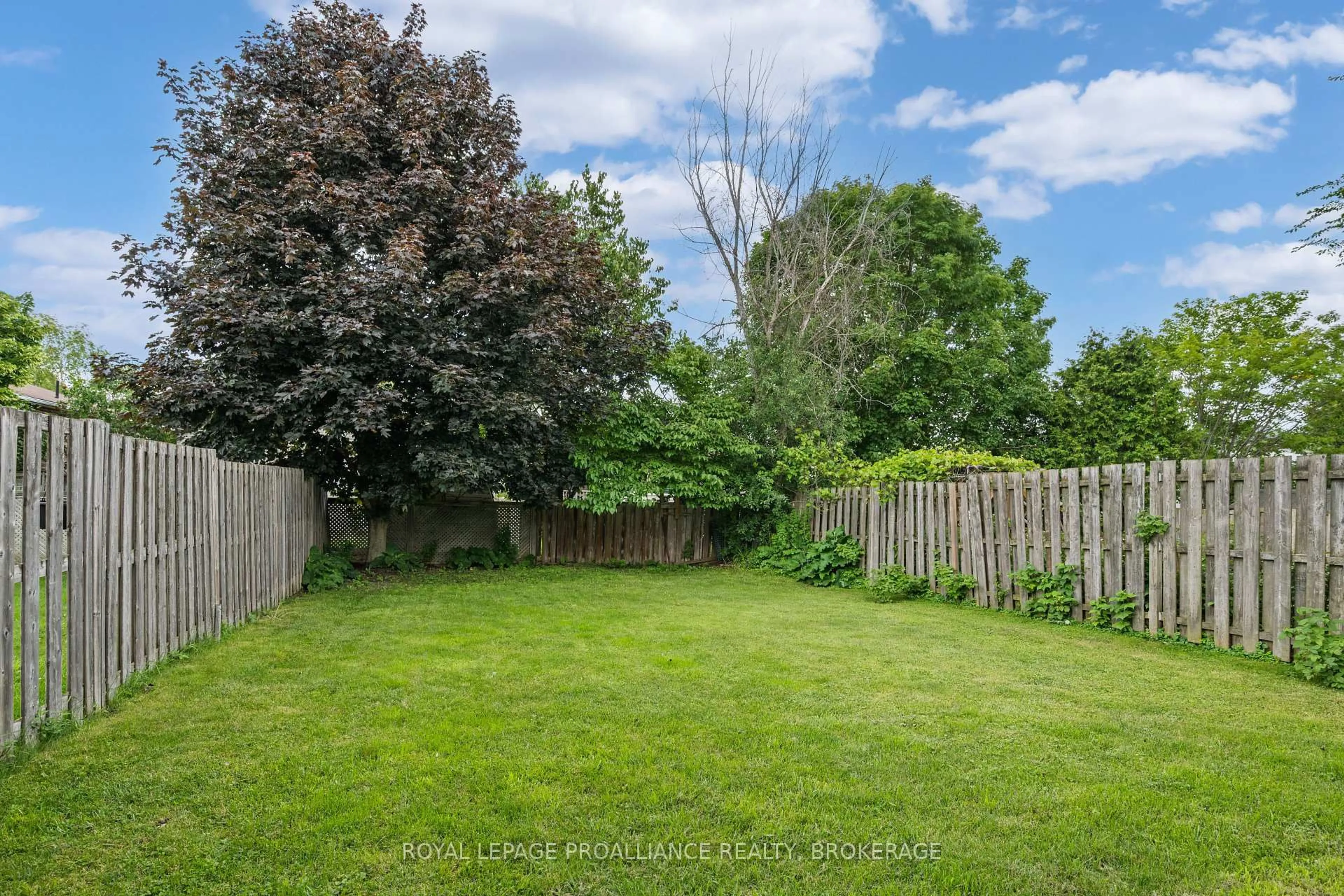 A pic from outside/outdoor area/front of a property/back of a property/a pic from drone, forest/trees view for 653 Barnsley Cres, Kingston Ontario K7M 8X4
