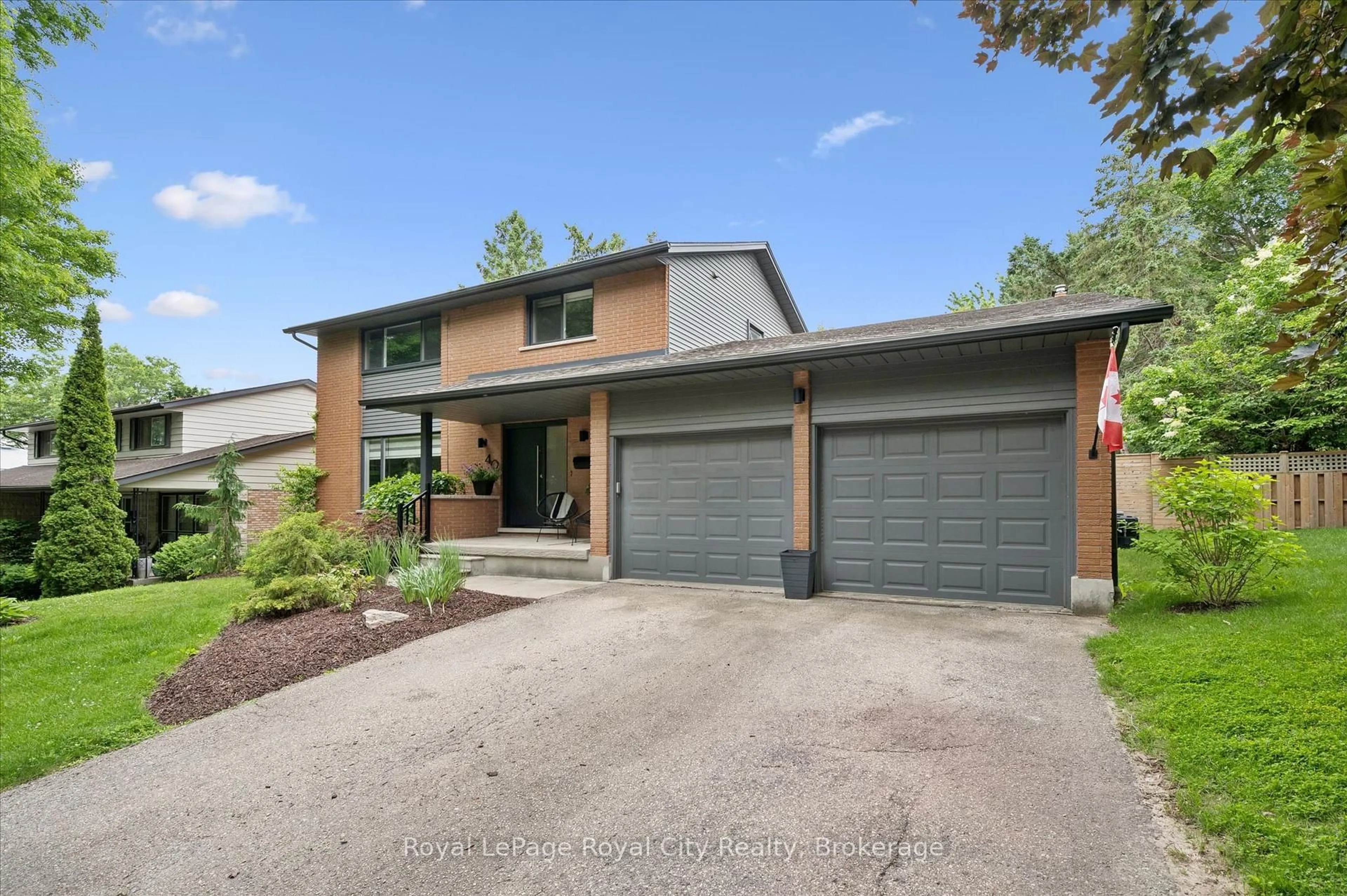 Home with brick exterior material, street for 40 Walnut Dr, Guelph Ontario N1E 4B3