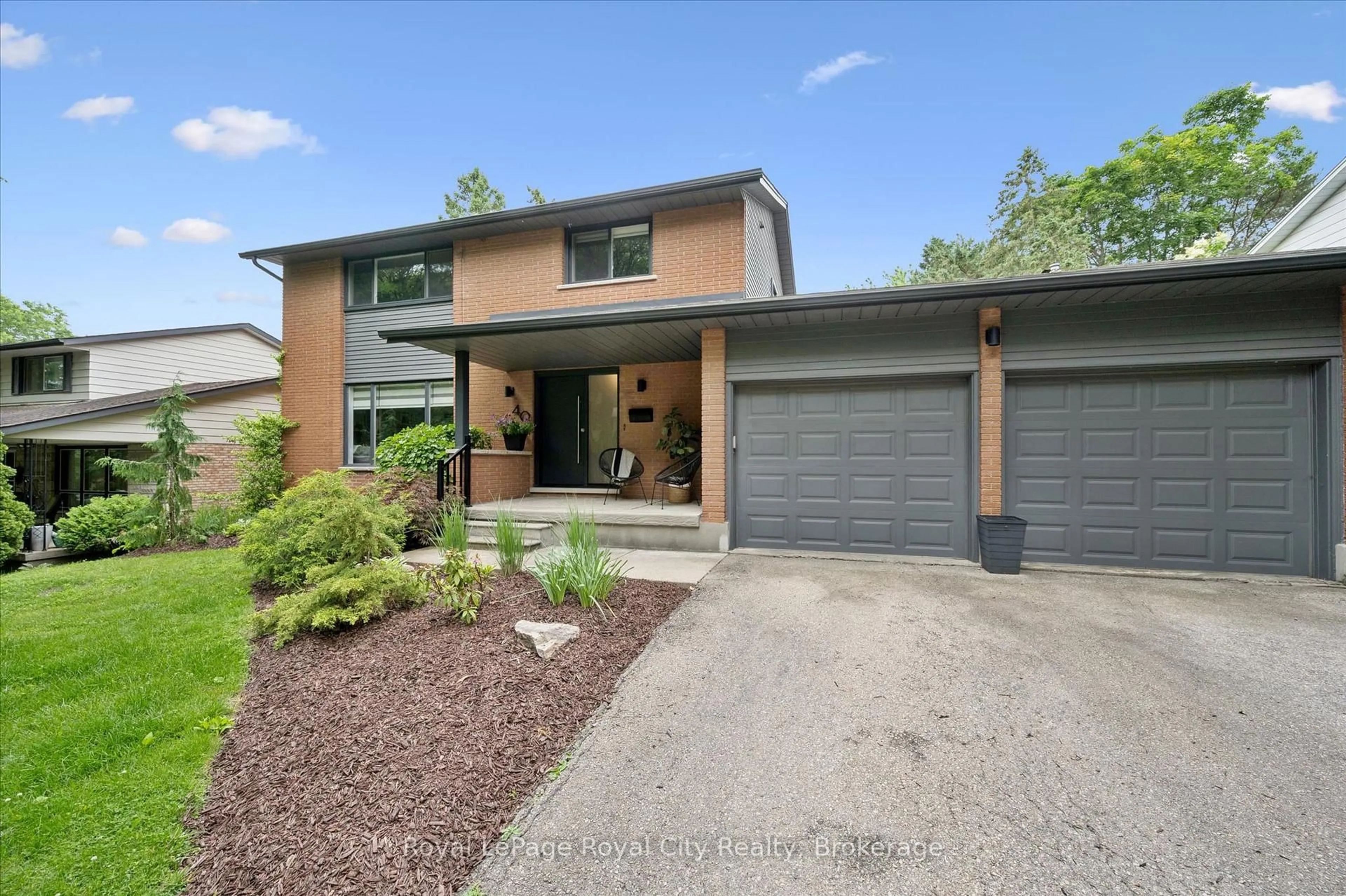 Home with brick exterior material, street for 40 Walnut Dr, Guelph Ontario N1E 4B3