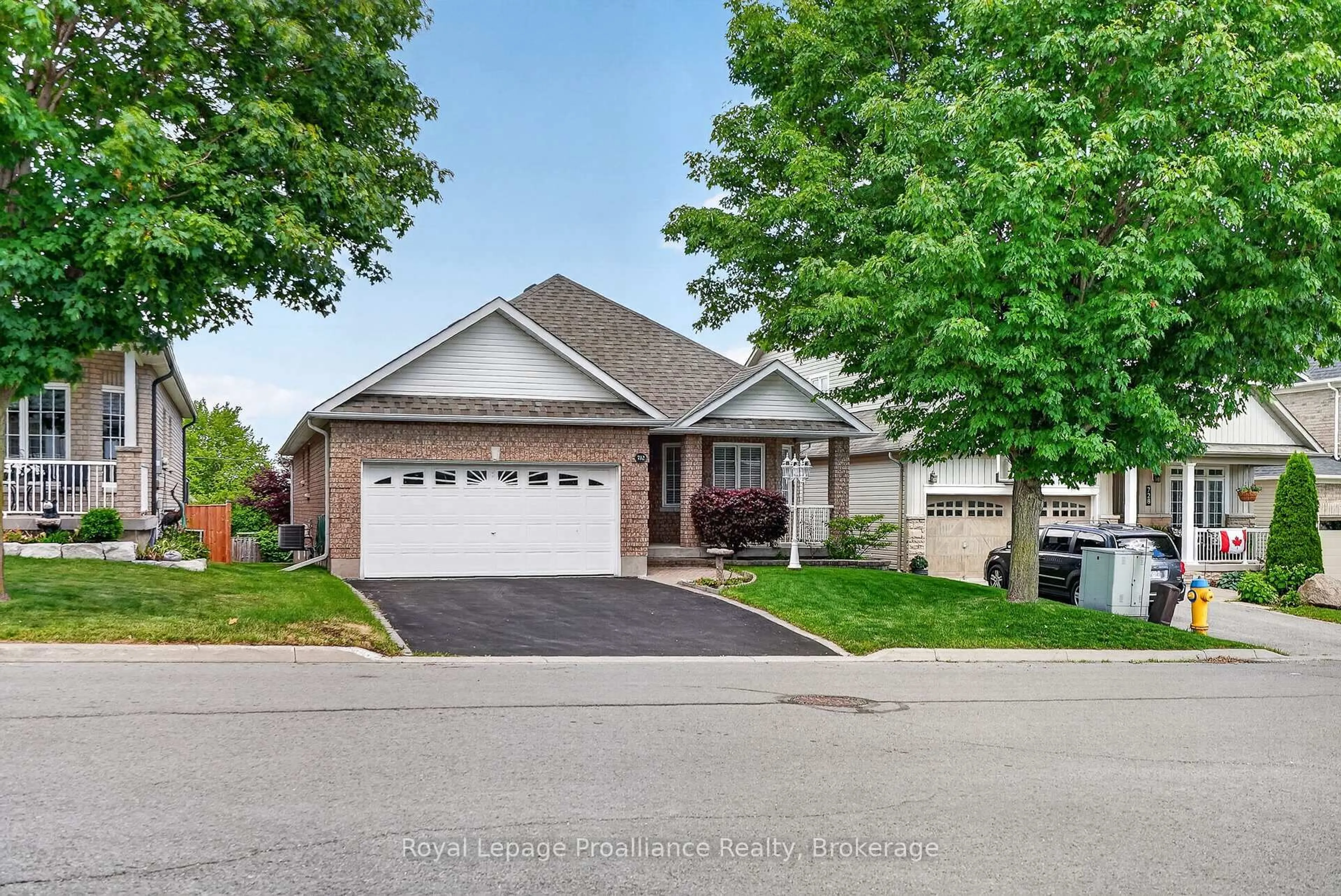 Home with brick exterior material, street for 732 Prince Of Wales Dr, Cobourg Ontario K9A 5X8