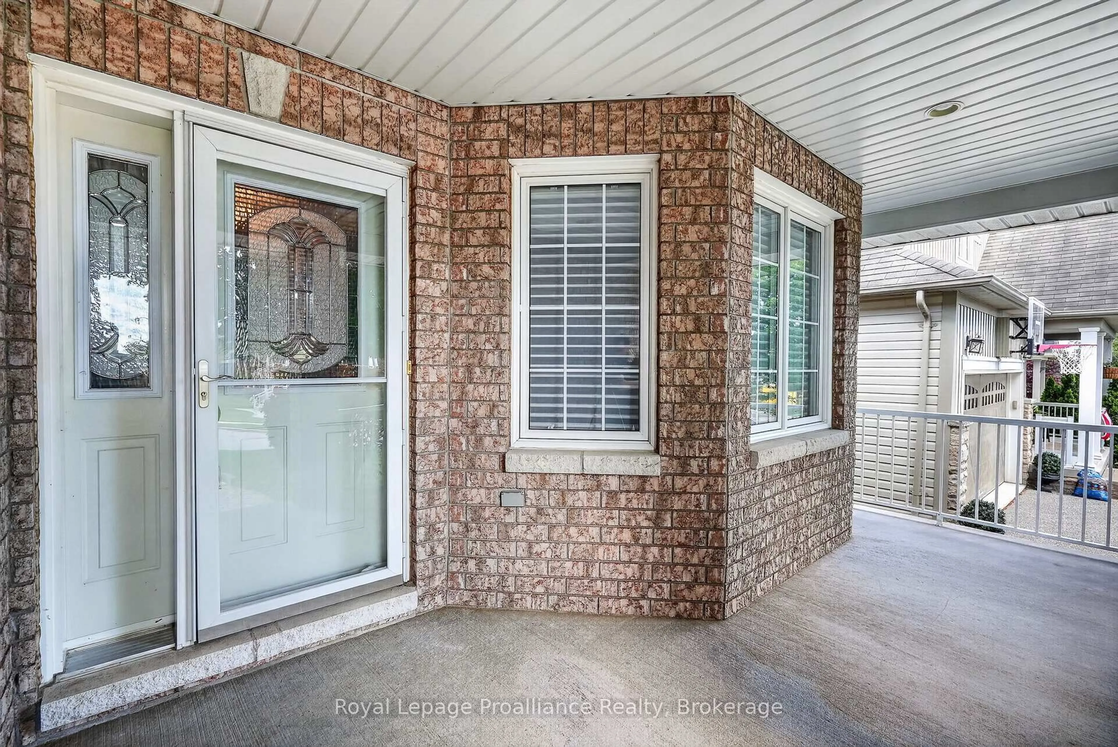 Home with brick exterior material, street for 732 Prince Of Wales Dr, Cobourg Ontario K9A 5X8