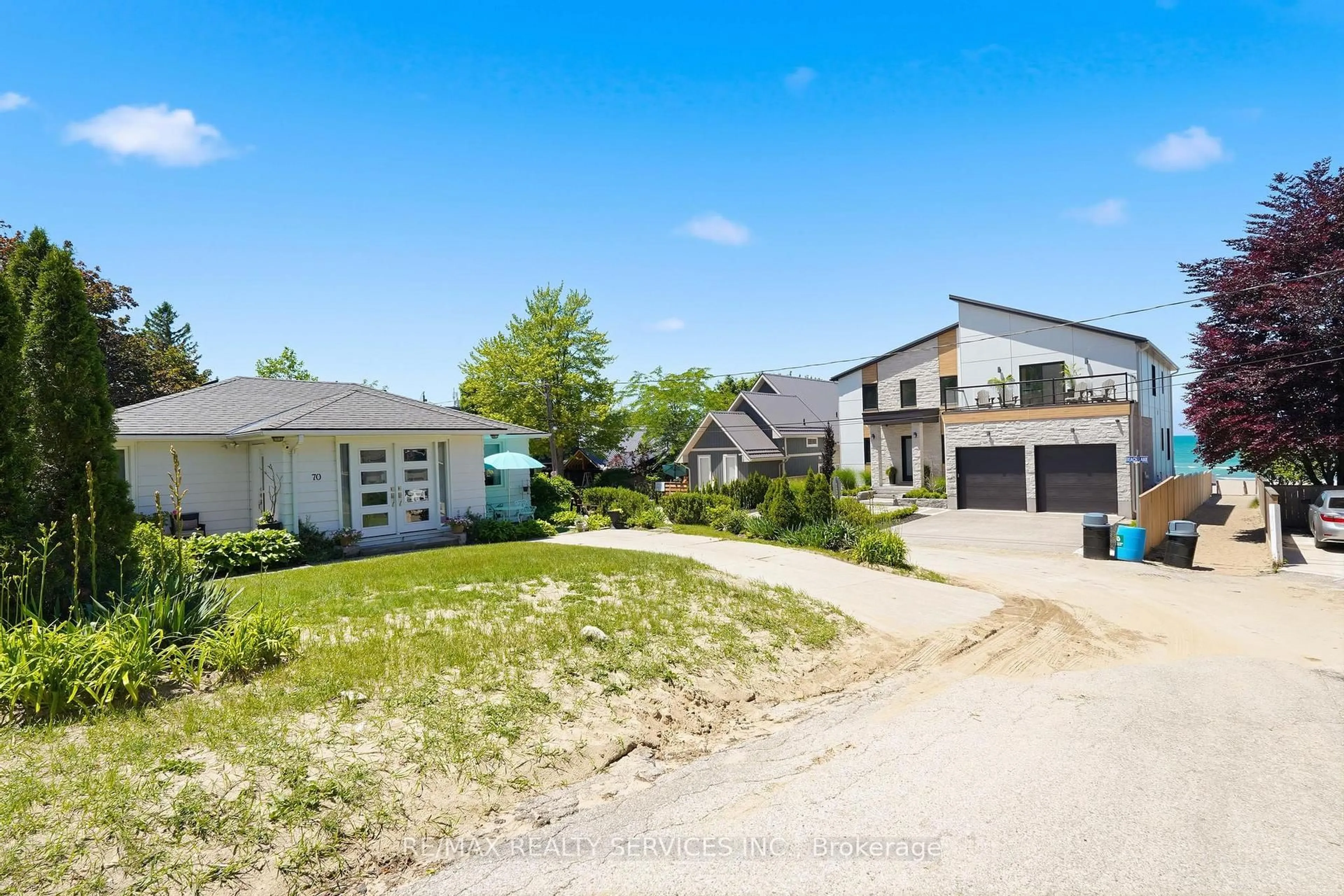 A pic from outside/outdoor area/front of a property/back of a property/a pic from drone, street for 70 Oak St, Lambton Shores Ontario N0M 1T0