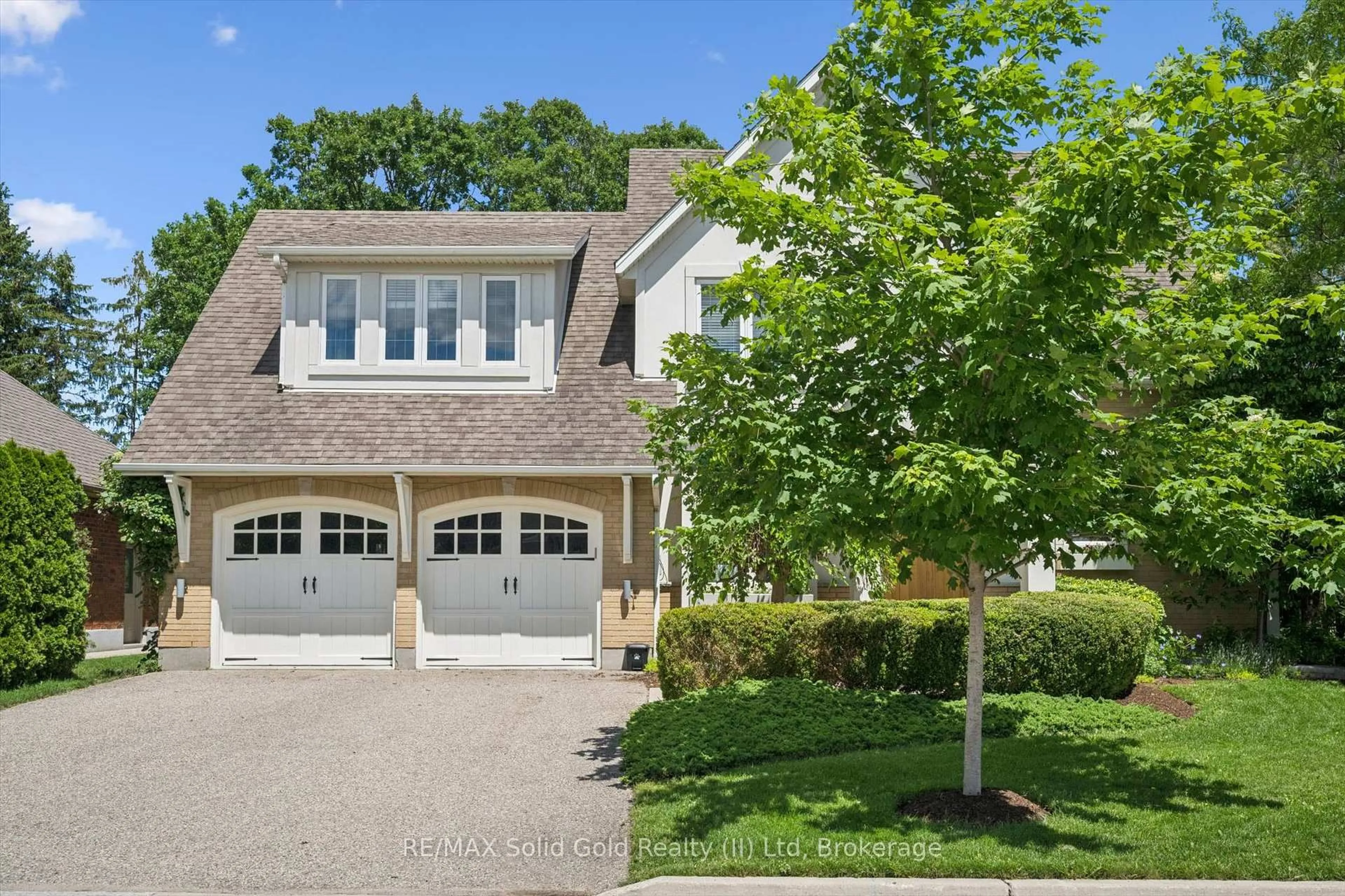 Home with brick exterior material, street for 576 Falconridge Cres, Waterloo Ontario N2K 4J2