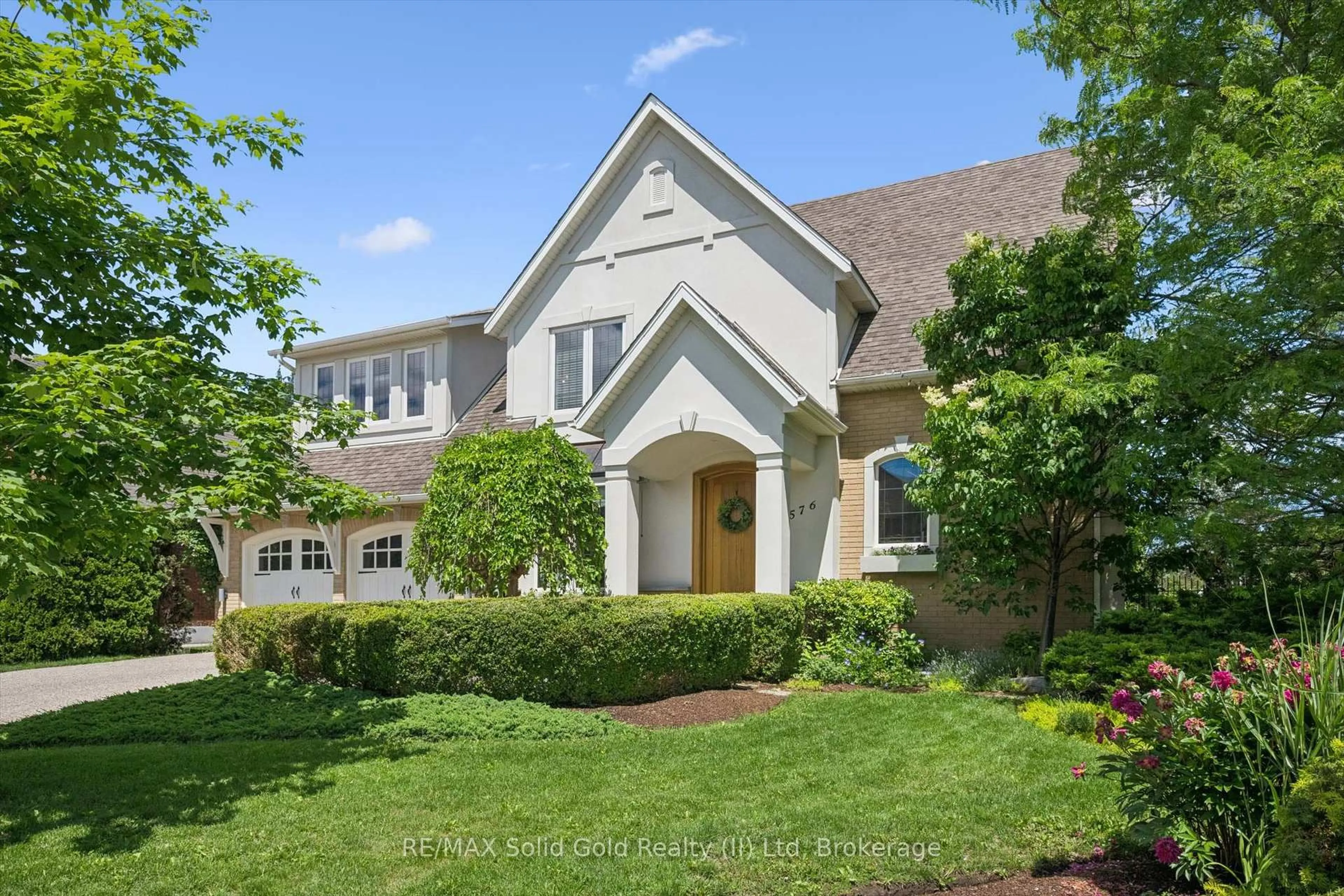 Home with brick exterior material, street for 576 Falconridge Cres, Waterloo Ontario N2K 4J2