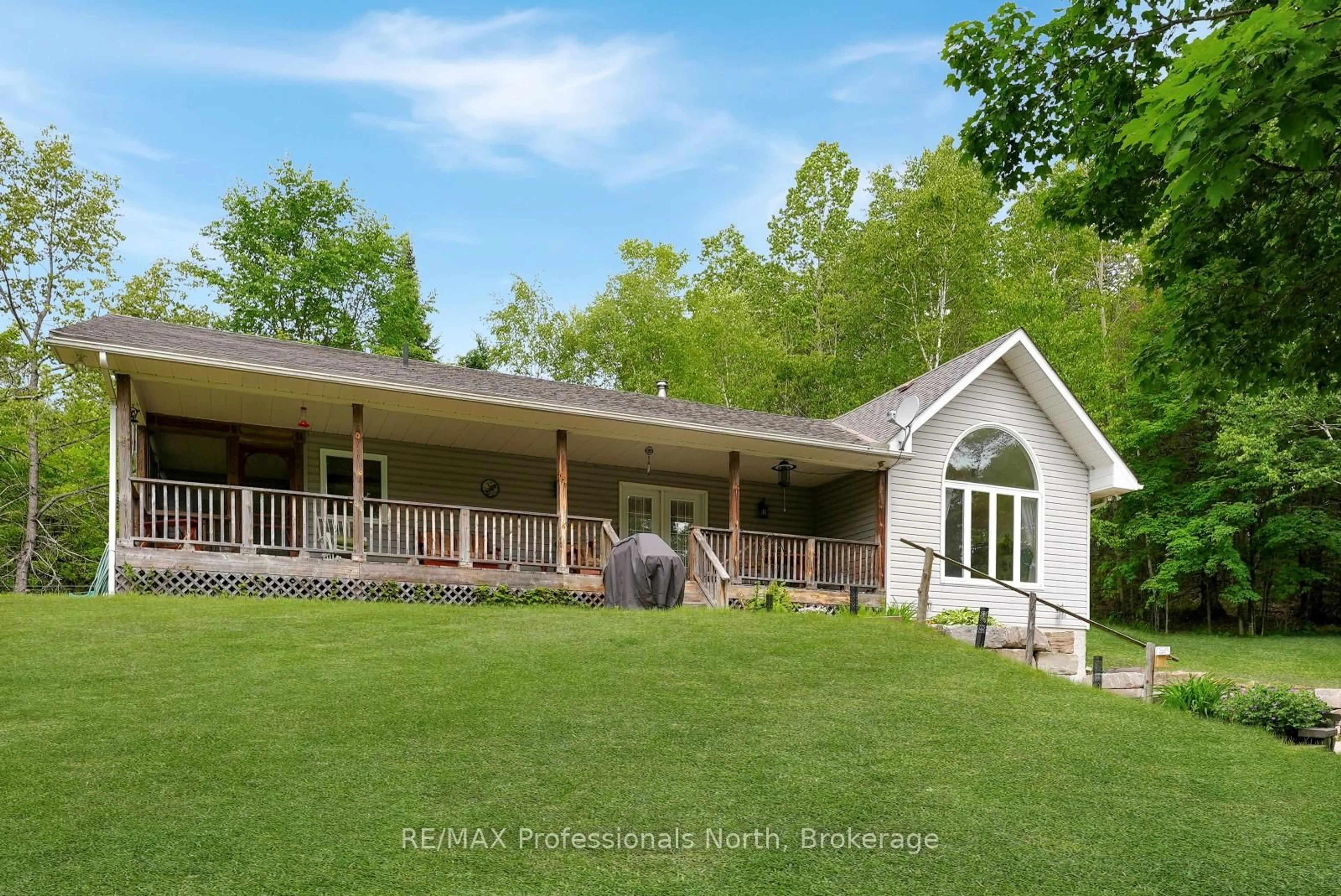 A pic from outside/outdoor area/front of a property/back of a property/a pic from drone, unknown for 17254 Highway 118, Highlands East Ontario K0L 2Y0
