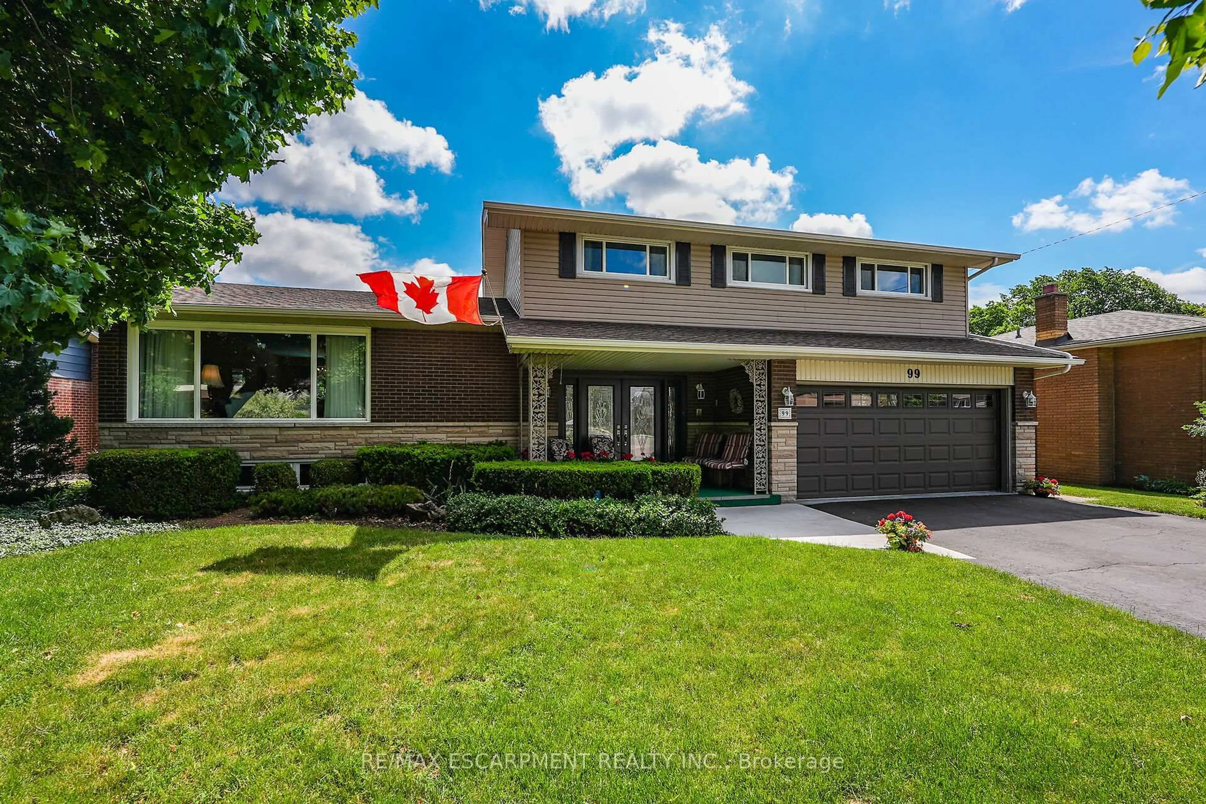Home with brick exterior material, street for 99 Elmhurst Dr, Hamilton Ontario L8T 1C5
