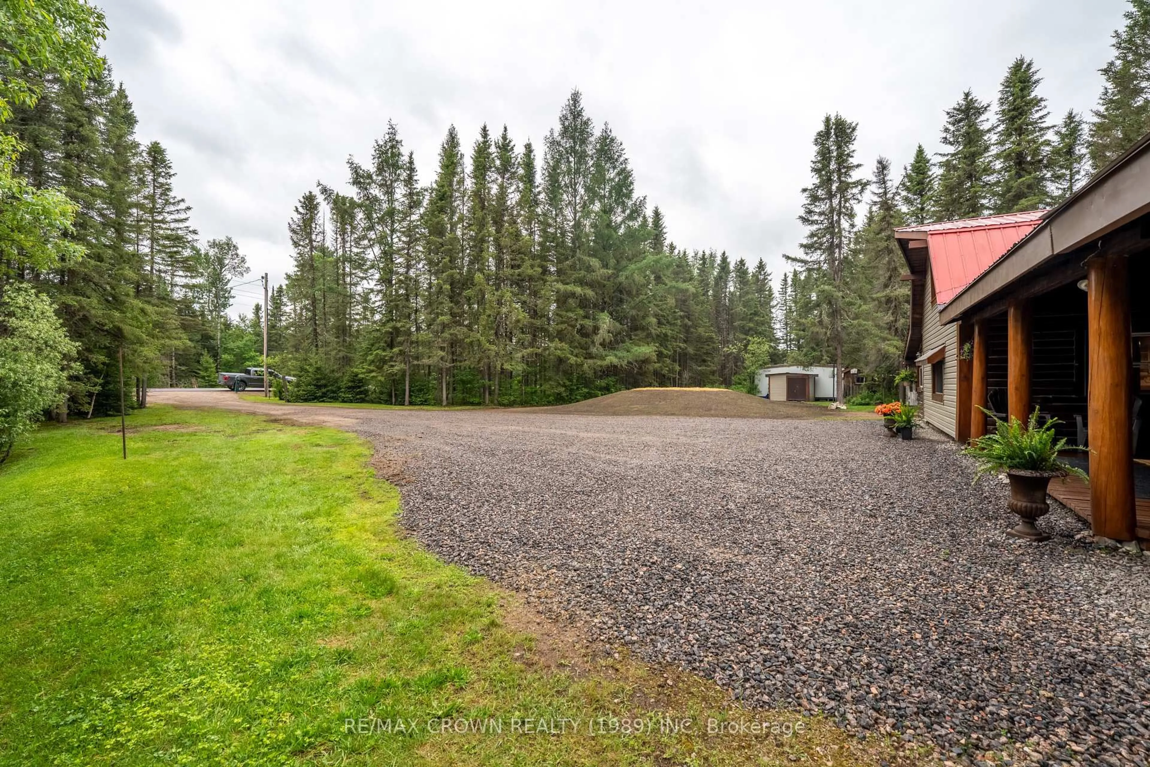 A pic from outside/outdoor area/front of a property/back of a property/a pic from drone, forest/trees view for 734 Highway 522, Powassan Ontario P0H 2L0