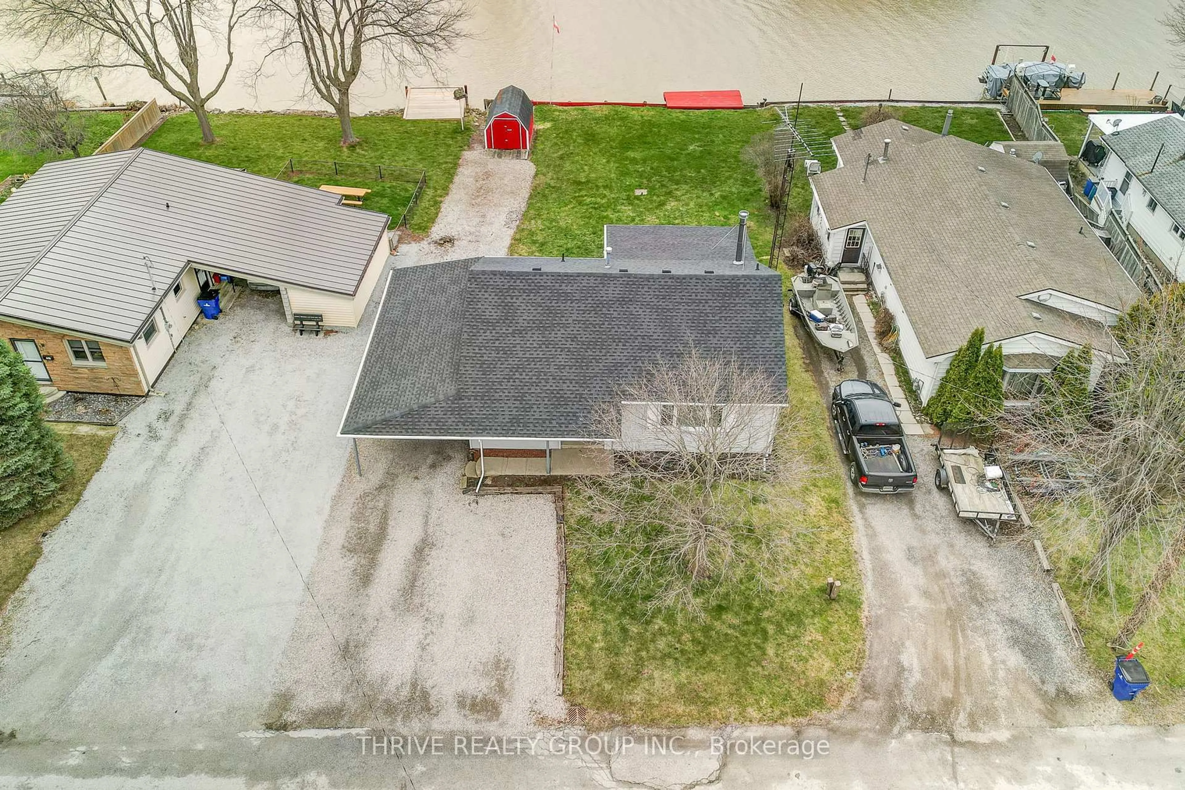 A pic from outside/outdoor area/front of a property/back of a property/a pic from drone, street for 131 Water St, Chatham-Kent Ontario N8A 2E8