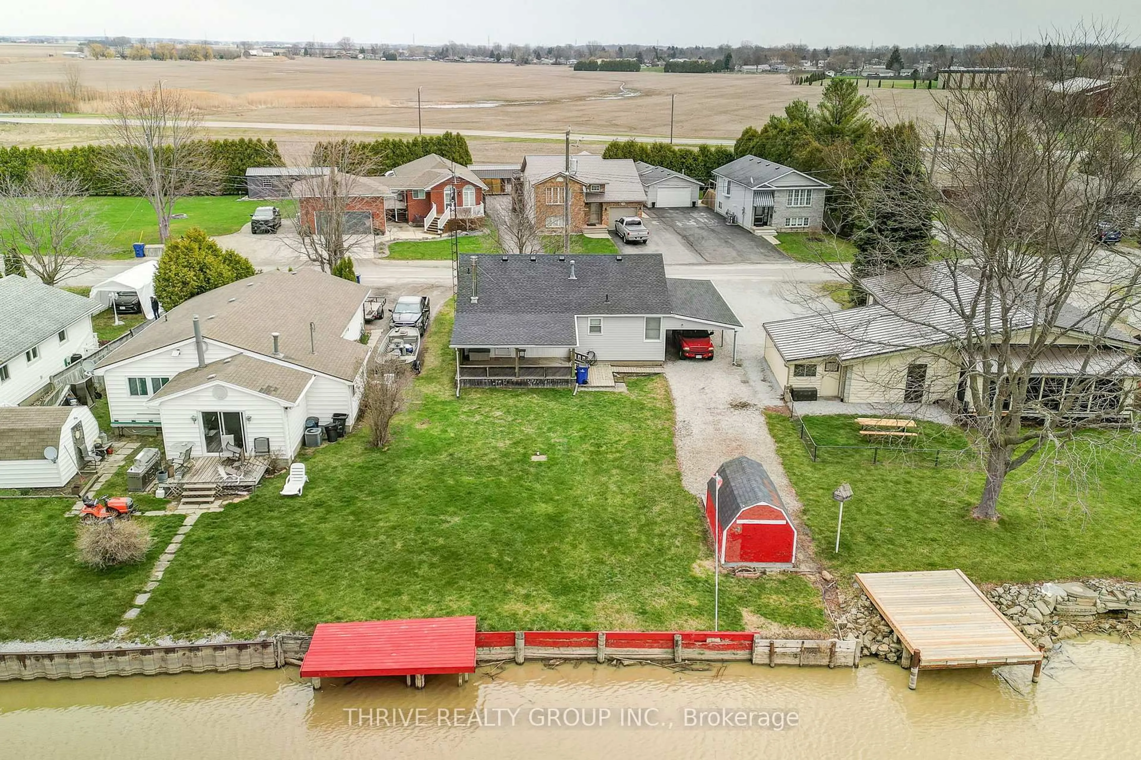 A pic from outside/outdoor area/front of a property/back of a property/a pic from drone, water/lake/river/ocean view for 131 Water St, Chatham-Kent Ontario N8A 2E8