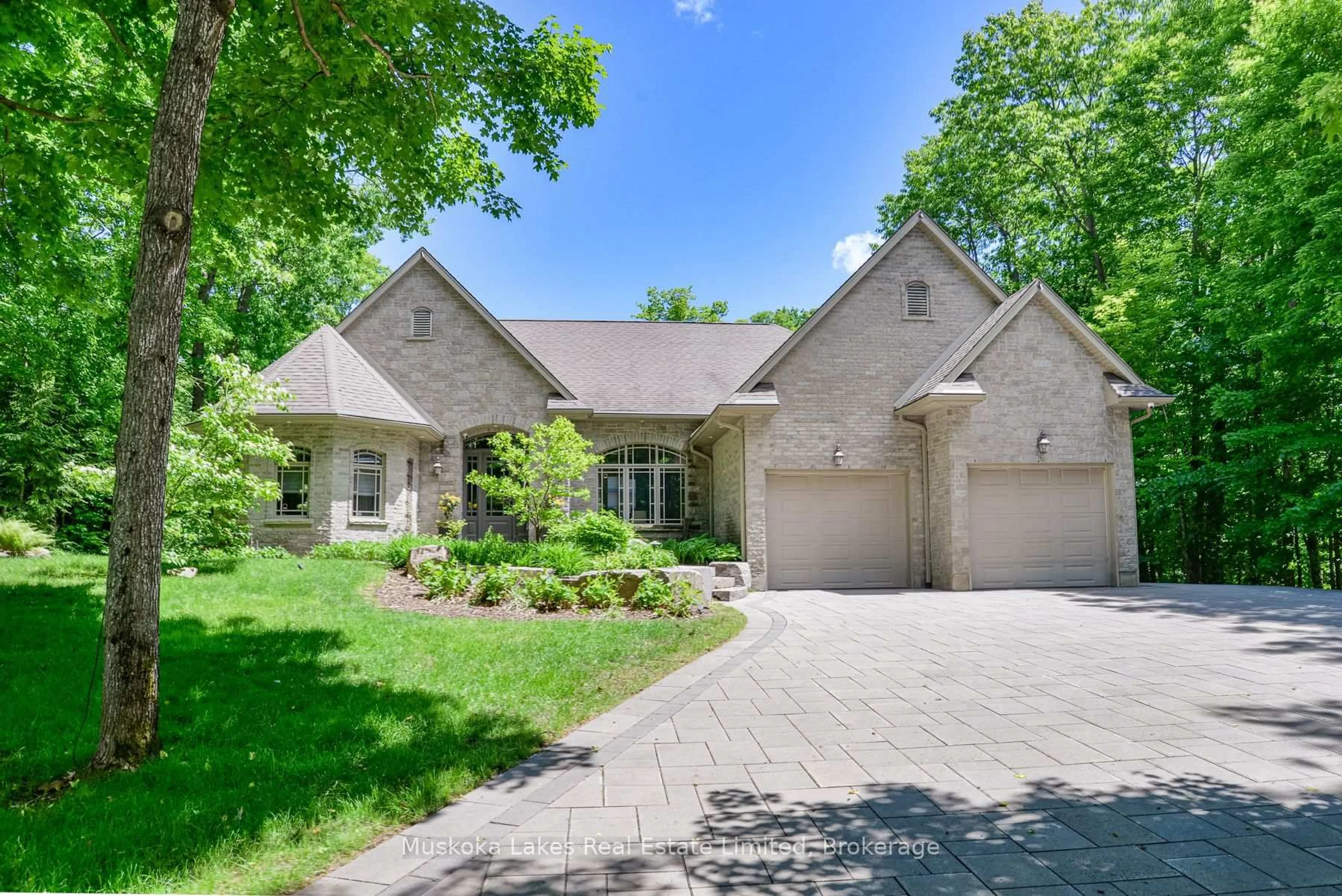Home with brick exterior material, street for 44 Estate Dr, Muskoka Lakes Ontario P0B 1J0