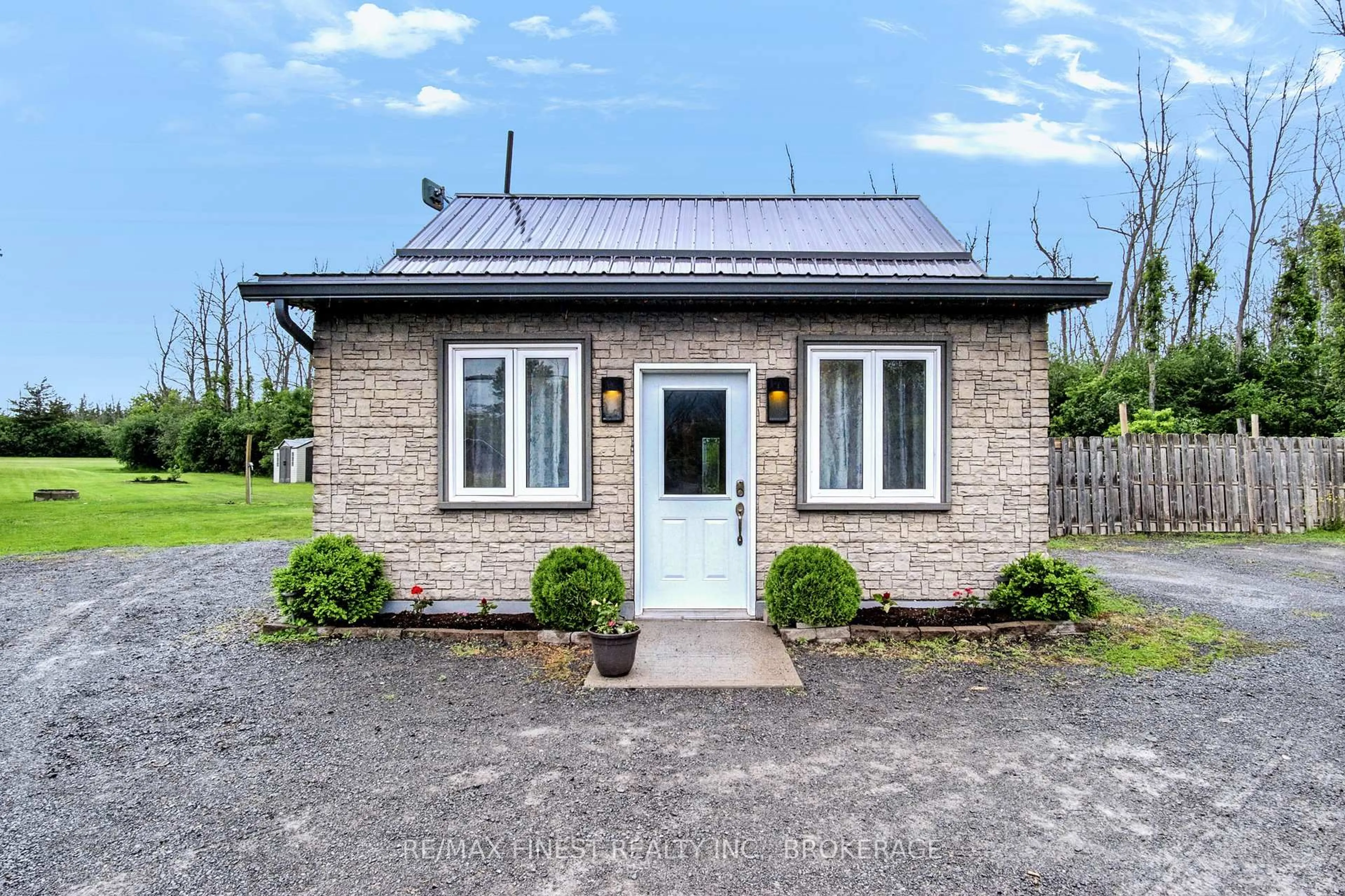 Home with brick exterior material, building for 8297 County Road 2, Napanee Ontario K7R 3K6