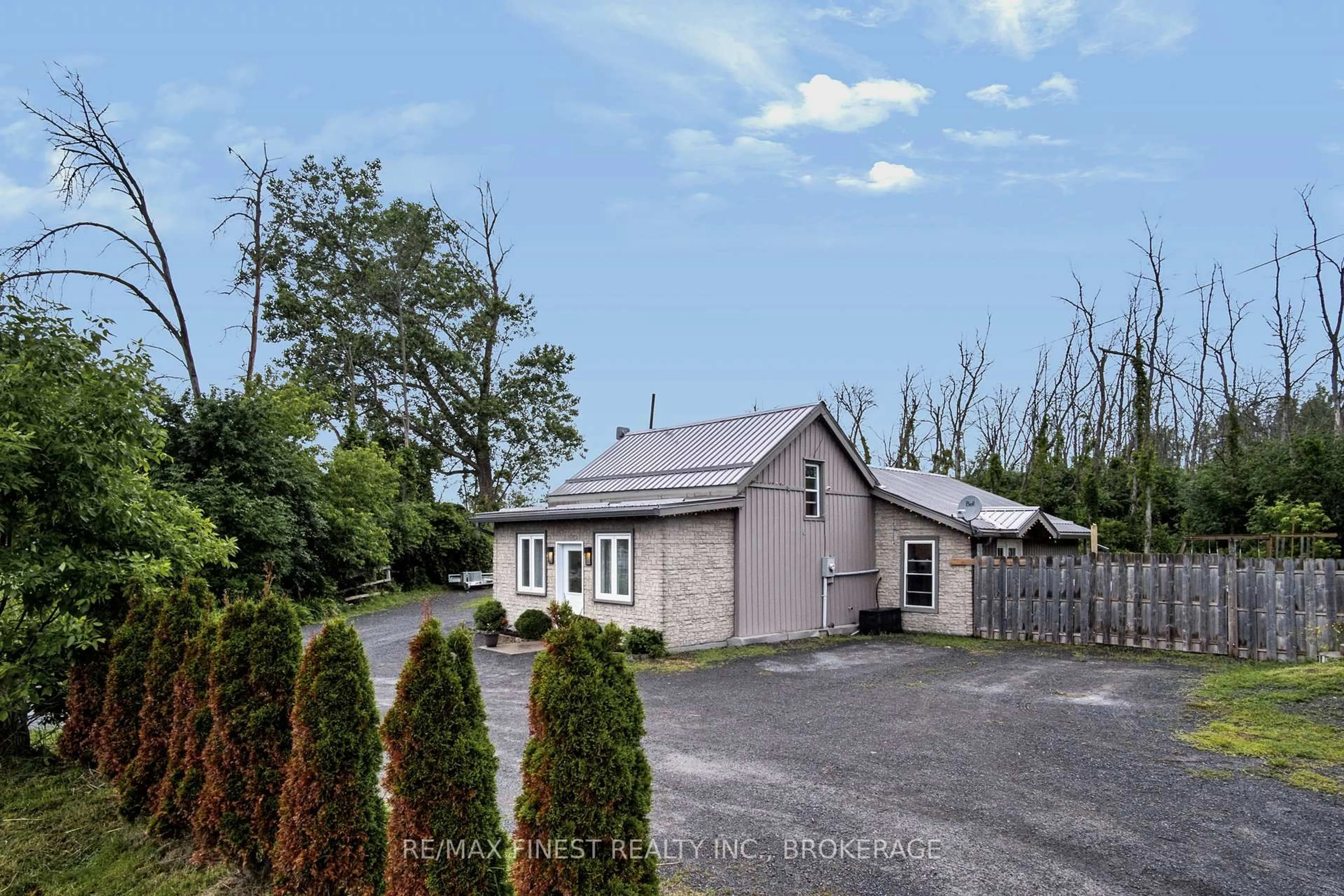 A pic from outside/outdoor area/front of a property/back of a property/a pic from drone, building for 8297 County Road 2, Napanee Ontario K7R 3K6