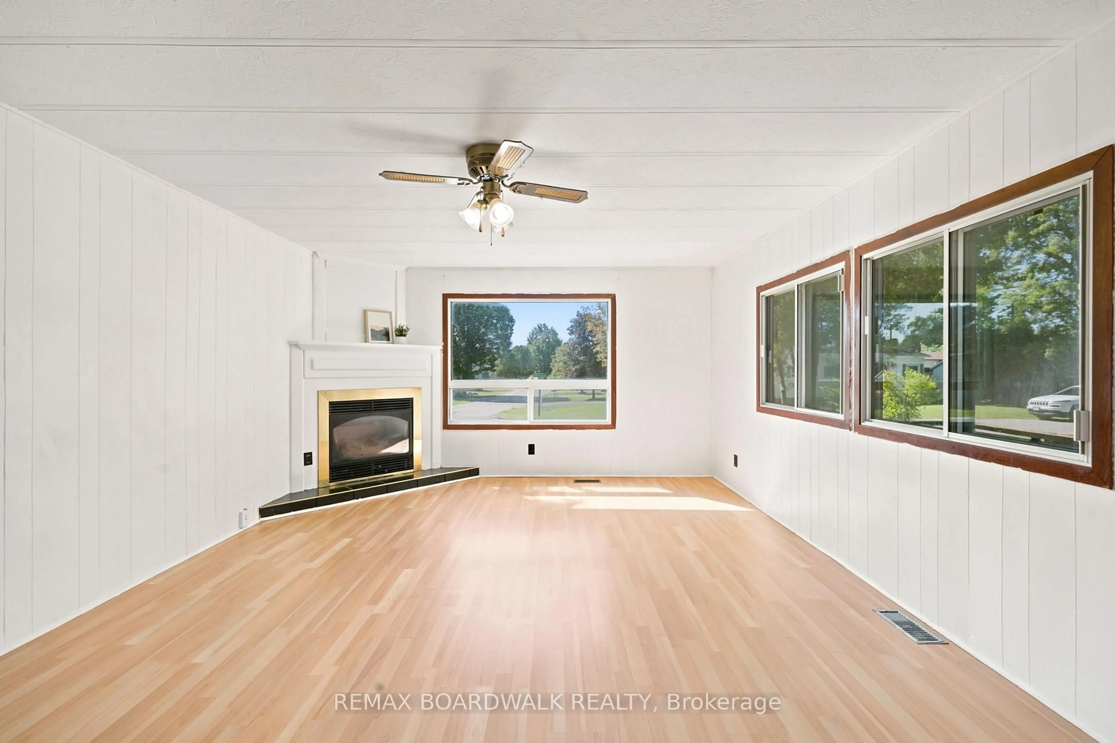 Living room with furniture, wood/laminate floor for 516 Maplegrove Rd, Carleton Place Ontario K7C 4R4