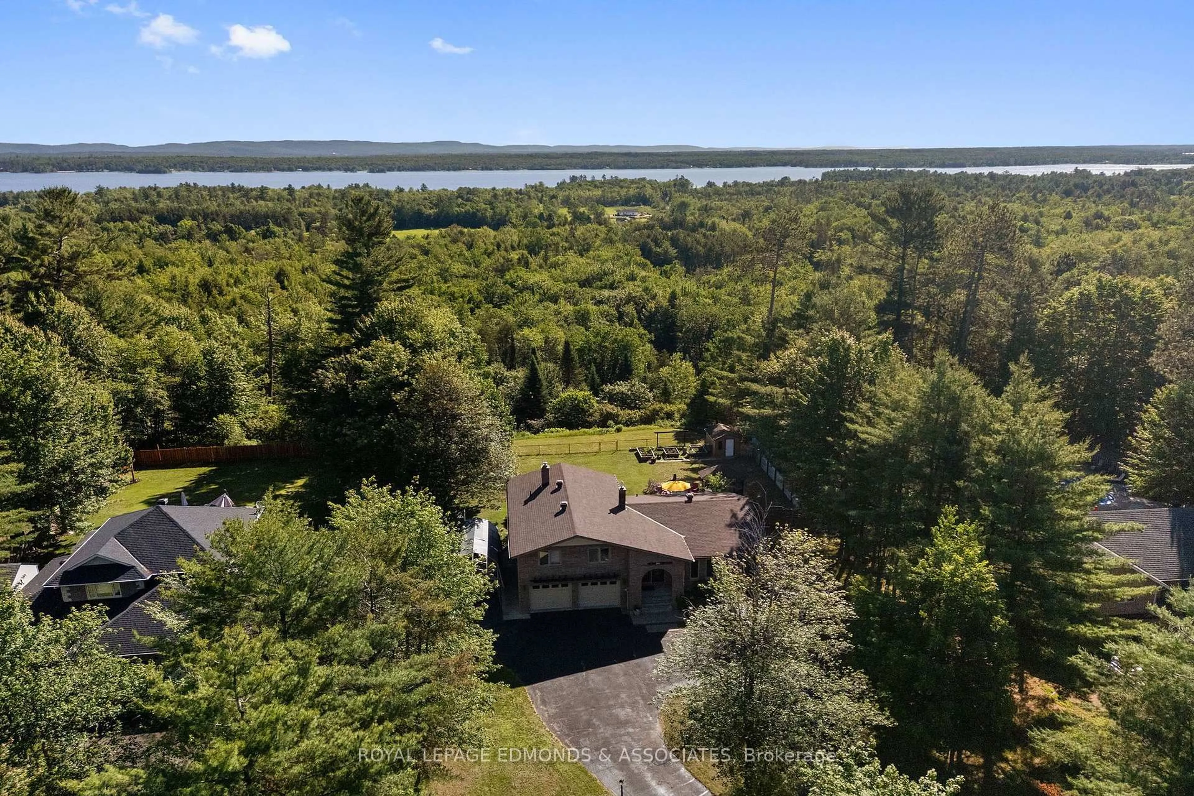 A pic from outside/outdoor area/front of a property/back of a property/a pic from drone, water/lake/river/ocean view for 37 Selley St, Petawawa Ontario K8H 3G9