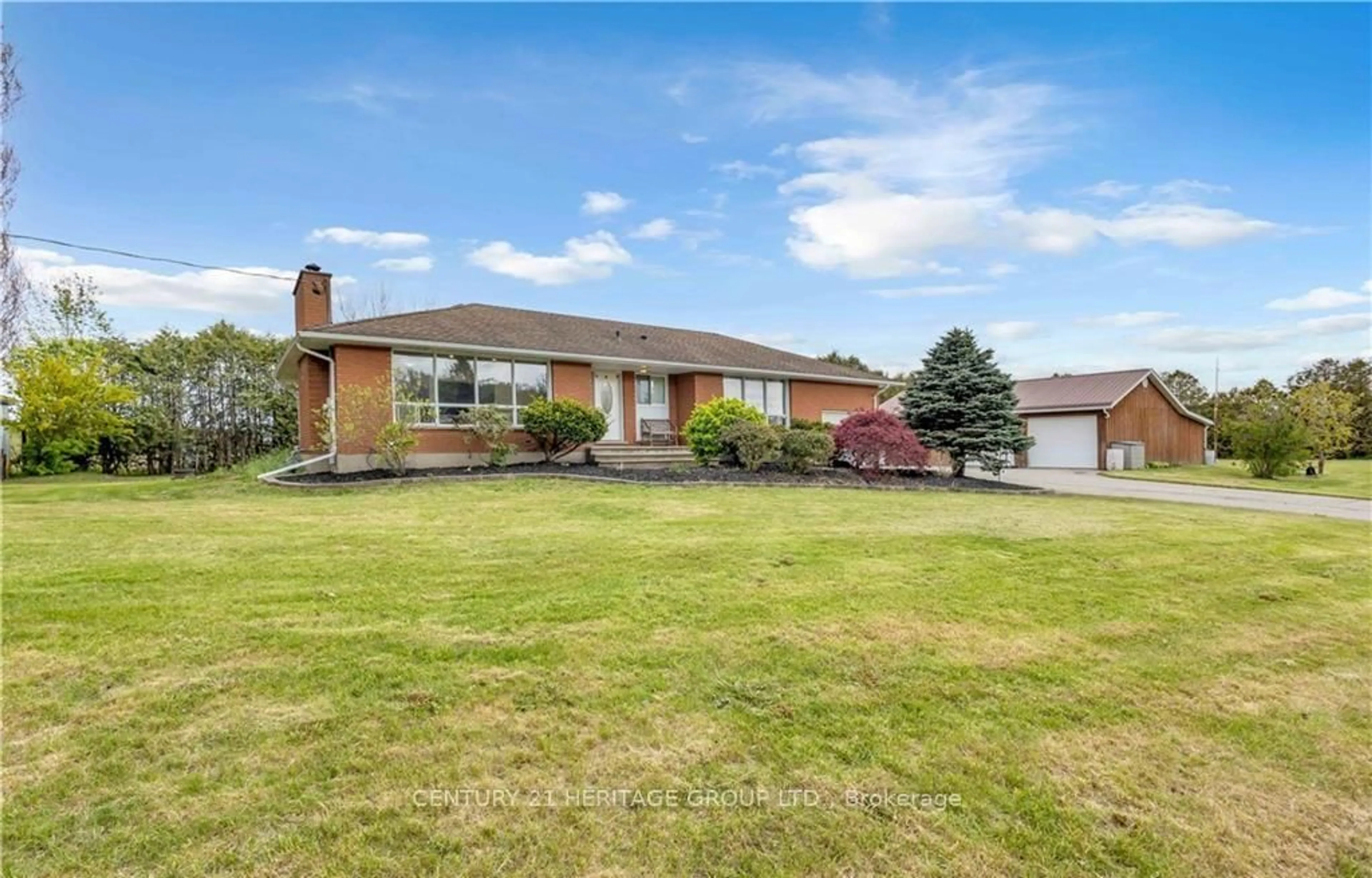 A pic from outside/outdoor area/front of a property/back of a property/a pic from drone, street for 348 Windham Road 12 Rd, Norfolk Ontario N3Y 4K6